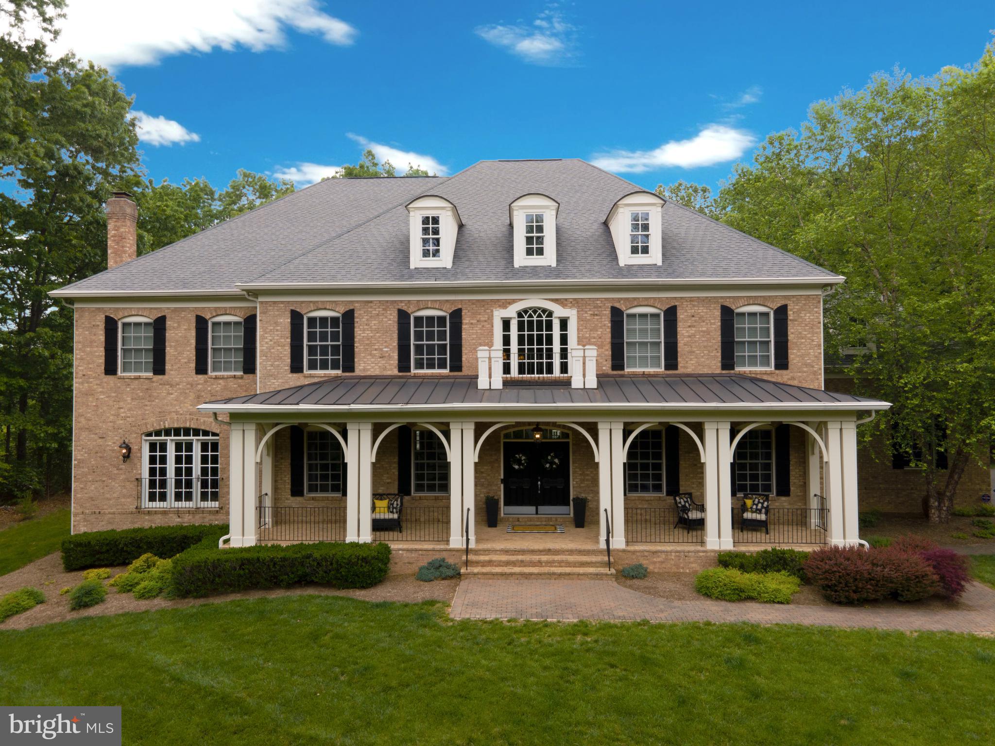 Come explore this Grayhaven Elevation 2 by Marquis Custom Homes, original owner of 2006 new build. UNBRANDED VIRTUAL TOUR: https://my.matterport.com/show/?m=PEThEc3gh4b Enjoy the linked 3D Virtual Tour to explore 12794 Yates Ford Rd from a distance!  Impeccable 10,000+ sf  "Charleston-style" Farm House Colonial home as the crown jewel of a 6.29 acre private property that begins with a storybook-style entrance drive from a cul-de-sac private road. The inviting front porch opens into a main living area featuring an iron-rail curved staircase surrounded by multiple oversized entertaining spaces including a dedicated Dining Room and even a large nook for the grand piano.  This is the theme of the home combining function with design (freshly-painted!), highlighted by 5 gas fireplaces, a Great Room with stunning windows for exceptional natural light + coffered, 20-foot high ceilings off of the true Chef's Kitchen (featuring a built-in Sub-Zero Refrigerator and Viking 6-burner Gas Range).  A set of grand islands serve as the heart of the Kitchen with high-quality cream wood cabinetry and an adjacent, full service bar, walk-in pantry and 2 powder rooms for guests.  Bring the party downstairs with a complete Media Home Theater Room experience, a soundproof Recording Studio Music Room / Exercise Studio / NTC 6th BR, and a Walk-In Wine Cellar.  The main lower-level area features a full bar and open entertaining space that walks out to a hardscape fire pit patio under the expansive Trex deck. The In-Law / Nanny quarters with ensuite bathroom and walk-in closet offer plenty of space and comfort, with a guest half bath down the hall.  There is no shortage of storage either, with a dedicated room to house non-perishable goods and toilet paper.  The second-level can be accessed via dual staircases with a showcase Master Bedroom suite complete with an enormous walk-in closet and renovated Master Bathroom with a custom-tiled shower and soaking tub.  The Laundry Room can be found on the second level in the middle of 3 secondary Bedrooms, all with ensuite full Bathrooms.  The three-car garage bay can house any combination of vehicles and ATVs with the extended driveway pad outside for the RV.  Minutes to downtown Clifton and easy access to all points of Northern Virginia and Washington, DC. No HOA.