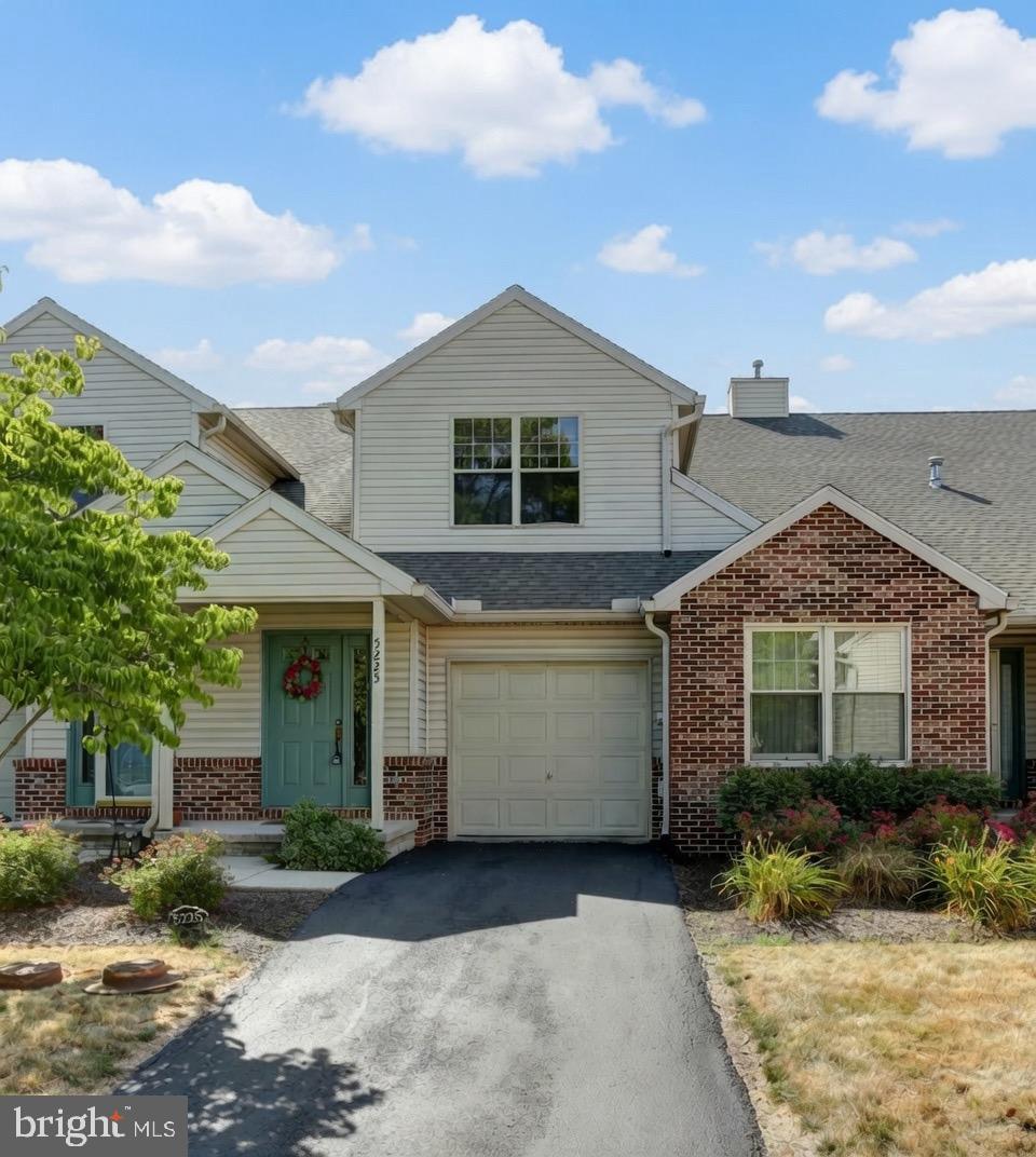 Discover comfortable, low-maintenance living in this beautifully maintained 3 bedroom 2 full-bath condo. Perfect for families, downsizers or anyone looking for turnkey convenience. Highlights include a spacious eat-kitchen with plenty of room for casual dining or entertaining, a living room with cozy gas fireplace and direct access to the screened porch, a large dining room perfect for family dinners and gatherings, a full walk-out basement providing a versatile space for a home office, family room, guest suite, or storage, and a one car attached garage for protected parking and extra storage. Heating/cooling system replaced in 2022; Roof replaced approximately 2023. Brand new used range. New carpet installed throughout. Home is available for immediate occupancy.
