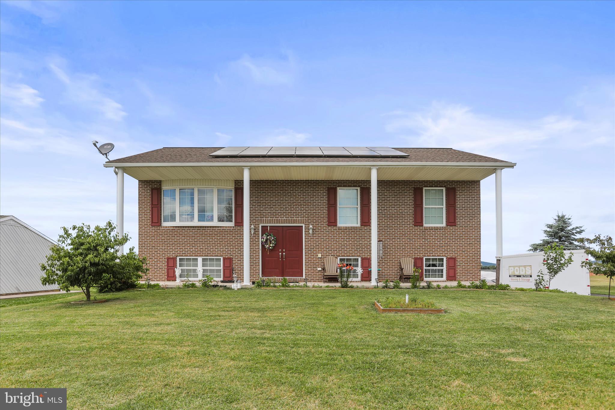 This move‑in‑ready home welcomes you with a beautiful brick front exterior and an impressive double front door that sets the tone for the rest of the property. The main level offers three comfortable bedrooms and a full bathroom, providing convenient one‑floor living. The finished basement expands your living space with a cozy family room, an additional full bathroom, and a dedicated laundry area. Car enthusiasts, hobbyists, or anyone needing extra storage will love the original two‑car garage plus the deep garage added in 2019—an ideal setup for a workshop or additional vehicles. Energy‑efficient solar panels add even more value by helping reduce your monthly utility costs. This property blends charm, functionality, and modern benefits, making it an exceptional place to call home.