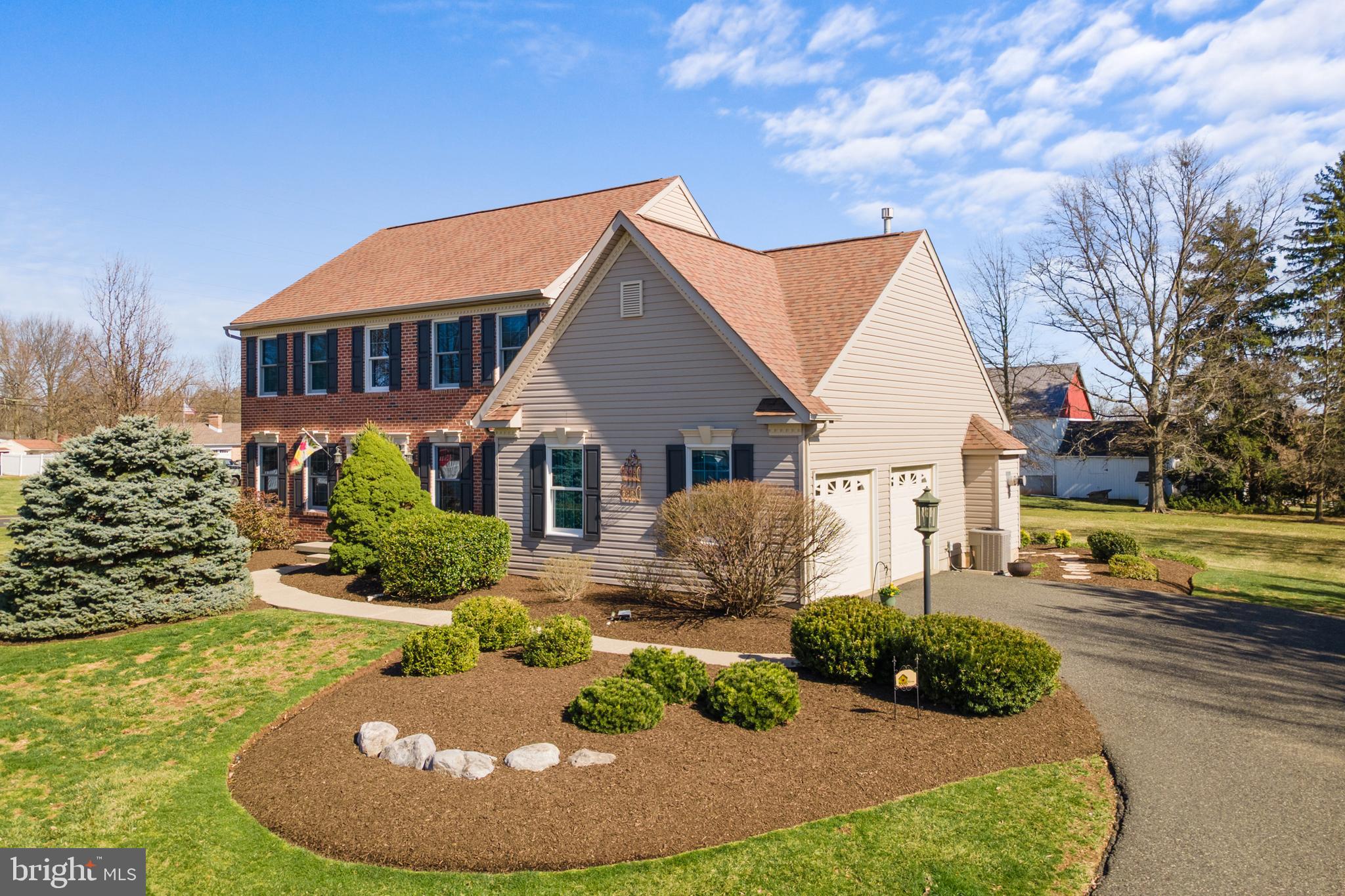 "Timeless , Tasteful, and Elegant"  just begins to describe this brick front Colonial home situated on a quiet cul-de-sac street in Franconia Township . 
 It was built by prestigious builder WB Homes, and features nothing but the best quality workmanship and materials. It has been lovingly maintained and thoughtfully updated.
The first thing you will notice when you drive up is the classic brick front and the amazing, well planned professional landscaping .  
You will enter the home through the dramatic two-story foyer with sparkling hardwood floors that flow seamlessly throughout the entire first floor.
Immediately to the left is a formal living room featuring crown molding and hardwood floors. Directly behind the living room is the formal dining room with crown molding and wainscoting.  It makes the perfect place for your formal entertaining.
The  large country kitchen is one you have always dreamed of and it features trendy cabinets, granite counter tops,  convenient center island, small work desk,  all stainless steel appliances, propane stove, and a cheerful breakfast nook that is ideal for you family meals. A newer sliding door leads to a peaceful rear deck comprised of maintenance-free composite materials.  Sit there in the morning and enjoy a cup of coffee overlooking the spacious rear yard.
The kitchen flows nicely into the  family room complete with a warm and cozy propane fire place.
It is the perfect place to snuggle up with a book or watch your favorite team play on those chilly winter  evenings.
 The first floor also features a well-placed den/office for those that work from  home or for the children's homework  space . 
The second floor features the same sparkling hardwood floors in the hallway, balcony and master bedroom suite. The master bedroom is well placed at the end of the home and features a vaulted ceiling, luxurious master bath with a comforting soaking tub, and a glass shower. You'll really appreciate the size of the walk-in closet . The second floor also features three additional bedroom all of ample size with wall to wall carpet for your comfort. There is a large full bath with tub/shower for the family or guests.
The entire family will thoroughly enjoy the fully finished basement featuring a partial kitchen and island that will serve well for prepping food and snacks for the family movie night or to watch  the big game. 
Adjacent to the recreation room is a large storage room for tools, seasonal decorations or anything else you want to tuck away .
The large two car side entrance garage was finished off with a sparkling Epoxy paint  that allows for a quick clean . There is plenty of room for your cars and tools.
The lot is oversized and level. The lawn has been professionally maintained and provides plenty of space for the kids to play ball or to add a pool.
Some very important features of the home include replacement windows on the entire front of the house, economical propane heat, new front door, new sliding door to the rear deck, pumpless sump pump that runs off of the public water ensuring a dry basement in times of prolonged power outages. 
This home is located just minutes from the center of Souderton Borough with restaurants,  a playhouse, shops, and the Broad movie theater complex, public pool, Indian Valley Country Club, and many township parks and walking trails.
Showings start Friday, March 28th at 1 pm. Open house Sunday 3/30/2025 at 1-3 pm
Hurry out and make it yours for the summer.
