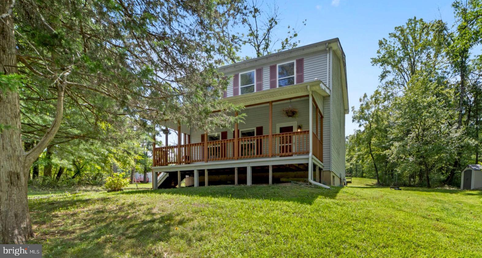 Welcome to 2015 Aquetong Road, an expansive property that offers over ten acres of serene and picturesque land with two separate homes, just minutes away from the eclectic charm of New Hope’s Main Street, where you can immerse yourself in a delightful array of boutique shops, galleries, and diverse eateries, or make your way across the bridge to Lambertville where you’ll find even more to explore. The property features not one, but two homes, each with its own character and potential. The main home, recently updated with fresh flooring and paint throughout, offers three bedrooms and 2.5 bathrooms. Imagine spending peaceful mornings on the roomy front porch, sipping your coffee as you take in the tranquil surroundings and embrace the serenity that this special location provides.  The second home is a two-bedroom, two-bathroom home that awaits your personal touch and vision, ready for a transformative renovation to make it your own. For those looking for ample space for vehicles and storage, the detached three-car garage is a valuable addition. And, as an added bonus, a cell tower on the property provides a steady income stream, offering a unique financial benefit to the future homeowner. Nature lovers will be thrilled by the property's close proximity to the Towpath Trail along the Delaware River, offering endless opportunities for scenic hikes, invigorating jogs, or leisurely bike rides through some of the region’s most beautiful landscapes. This property offers over ten acres of potential and promise, surrounded by the natural beauty and cultural richness of one of Pennsylvania’s most sought-after areas. Whether you’re envisioning a private retreat, an expansive estate, or simply a place to enjoy the best of both worlds—nature and town life—this property is a rare gem waiting to be discovered.
Both homes are being sold strictly As Is Condition!









i