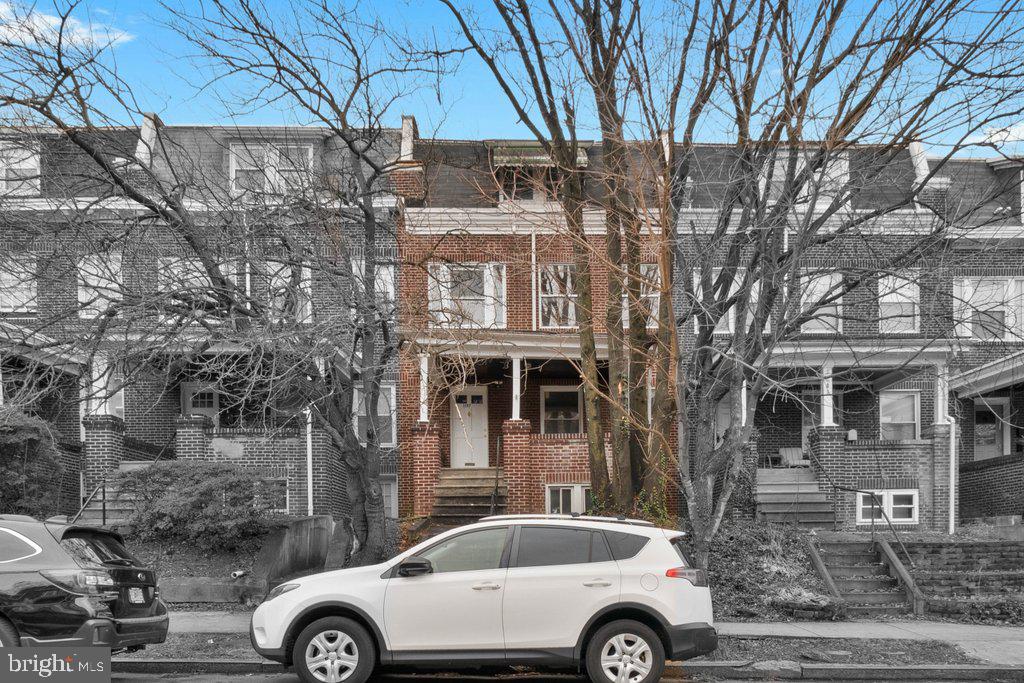 This rented 6-bedroom, 3-bath home is leased from 5/1/2025 through 5/31/2026, making it a turnkey investment for rental property owners.  Great investment property: 8.6 GRM @ market rents; 9.62% Cap Rate, 12.85% Projected Cash-on-Cash Return.  Current rent is $4,400; market rent is $4,600.  Tenants are responsible for all utilities and snow removal!

The home features wood floors throughout, fresh paint, and a denned-out basement. An oversized living and dining area provides ample space for entertaining. The kitchen is built for durability, equipped with a 30" gas range, refrigerator, dishwasher, garbage disposal, and easy-to-maintain laminate countertops. A convenient half bath is located on the main floor.

The second floor offers four bedrooms and a full bath, while the third floor has two additional bedrooms and another full bath. The partially finished basement provides abundant storage or extra living space and includes a third full bathroom, along with a washer and dryer.

This property holds a valid rental license through 4/4/2027 and is professionally managed by a local company for added ease.

Residents can enjoy free street parking on Guilford Avenue, while those seeking off-street parking have access to over 20 nearby garages, professionally managed by Preller Properties.

The property is just four walkable blocks from Johns Hopkins University Homewood Campus and the Charles Village Shopping District, home to Chipotle, Starbucks, Barnes & Noble, Streets Market, and a variety of shops and restaurants. Union Memorial MedStar Hospital is conveniently located two blocks north.

For added peace of mind, the street is monitored/serviced by Charles Village Special Benefits District and Johns Hopkins Campus Security Officers.

Incoming group of tenants did receive a leasing incentive; May 2025 Rent is discounted to $2700.  See our cash flow in documents.