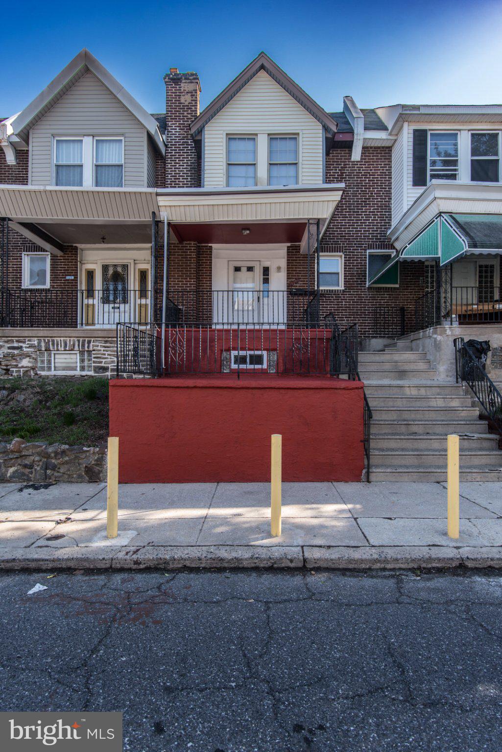 Welcome to this charming single-family, brick front, Straight Thru rowhome in the Wissinoming neighborhood of Lower Northeast Philadelphia. This home is a blend of original quality features that have been well maintained with some modern updates, making the home Move-In Ready! You are welcomed by the amazing curb appeal – tree lined street, large front patio and an open Porch that is perfect for entertaining or just relaxing.  As you enter the main floor, you will be met with durable laminated flooring in the living room and a formal dining area. The kitchen has lots of room for storage and a bonus area that can be used as a coffee bar/breakfast nook and more. The lower level includes a semi-finished basement that can be used as a home office/playroom, has a bonus room for storage and a powder room. The garage has been enclosed and can be used as a storage space, gym or workstation/hobby room. There are laundry hook ups for a washer and dryer (appliances not included). As you exit the rear basement door, there is one spot for private off-street parking and a common driveway for rear access to the property. Upstairs you will find 3 nice sized bedrooms and a full bathroom to accommodate all of your needs. The bathroom skylight allows for natural sunlight to brighten the space. This home is priced to sell and awaits your personal touch! Ideally situated with easy access to transportation, major highways, schools and shopping.