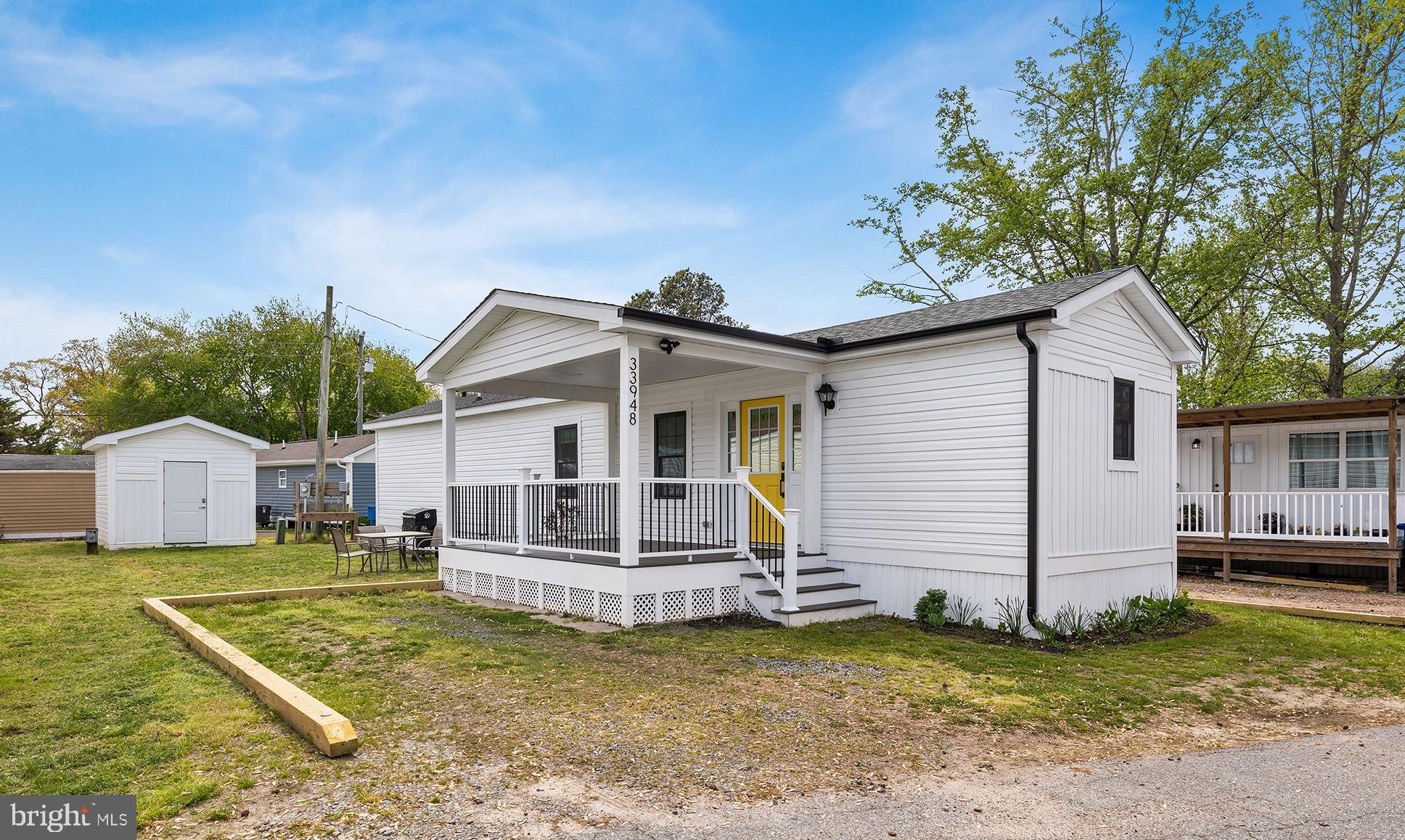 Welcome to easy living in Love Creek, Lewes. This beautifully updated 2-bedroom single-wide home, renovated in 2025, is move-in ready with a refreshed interior and comes furnished. Recent upgrades include a thoughtfully renovated kitchen with quartz countertops and stylish new cabinetry, along with new flooring, drywall, fresh paint, updated windows throughout, new siding, and recessed lighting. The home also features new front and back porches, perfect for relaxing and enjoying the outdoors, as well as a new shed for additional storage. Whether you're looking for a full-time home or a weekend getaway, this property offers comfort and convenience in a great coastal location.