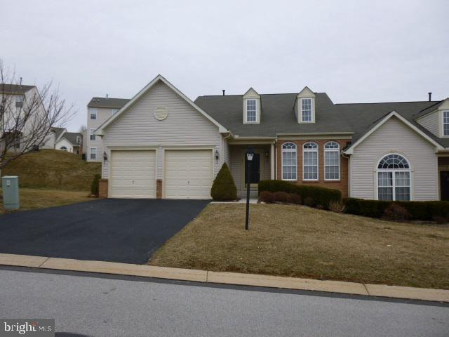 Enjoy carefree living in this 3-story Condo. Everything is available for 1st floor living. Outside entrance added for the lower level. Also a theater system and half bath is included in the lower level. Deck, 2-car garage and more. Only a few blocks to I-83 and convenient for shopping.