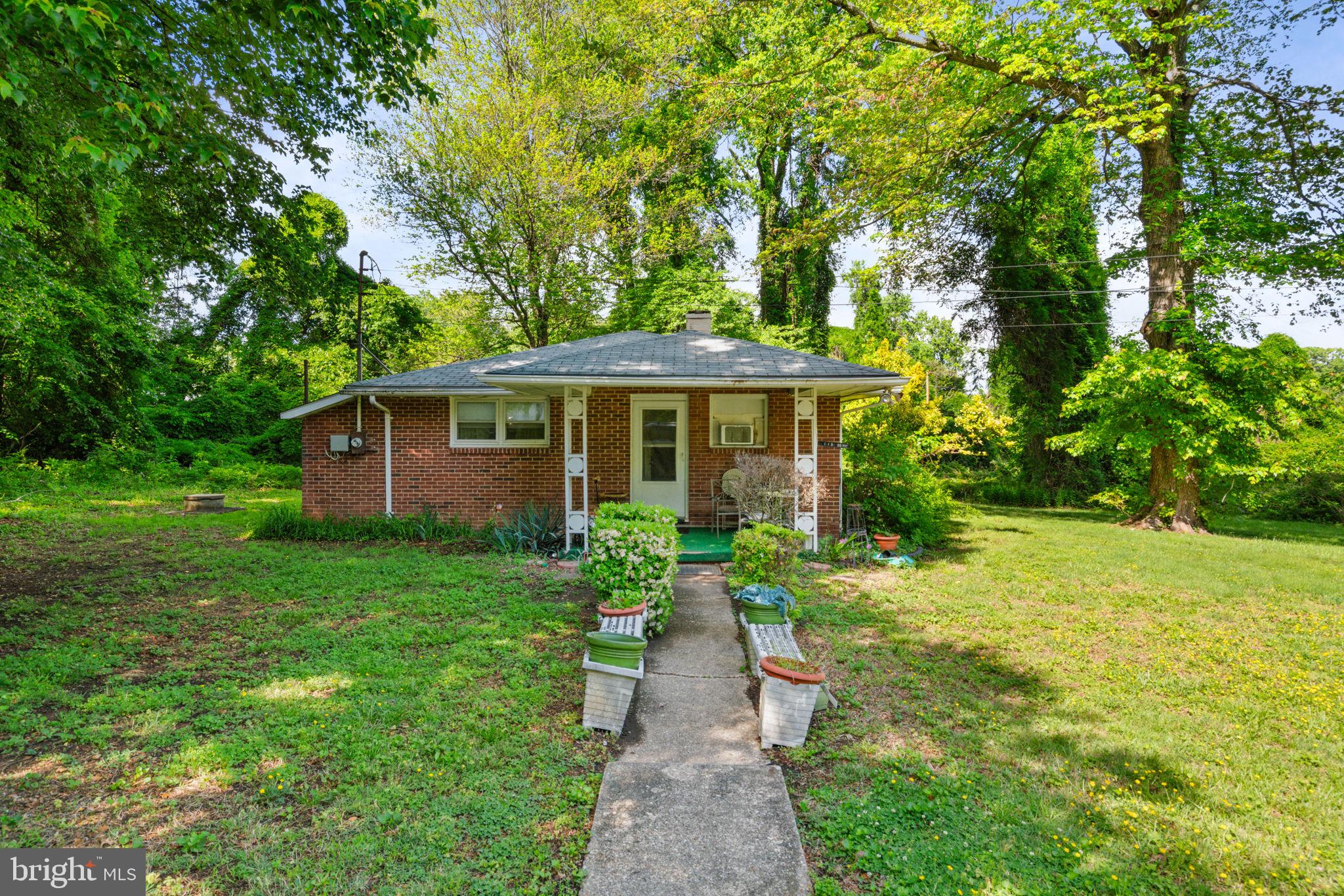 Don’t miss this great opportunity to own a charming rambler in the heart of Woodbridge! Situated on a private and spacious 0.75-acre lot, this 3-bedroom, 1-bath home offers one-level living with hardwood floors throughout the main living area and bedrooms. The layout includes a kitchen and cozy family room—ready for your personal touch and updates. Conveniently located near shopping, dining, and commuter routes, this property combines privacy with accessibility. Home is being sold as-is. Seller requests 30-day post-occupancy after closing.