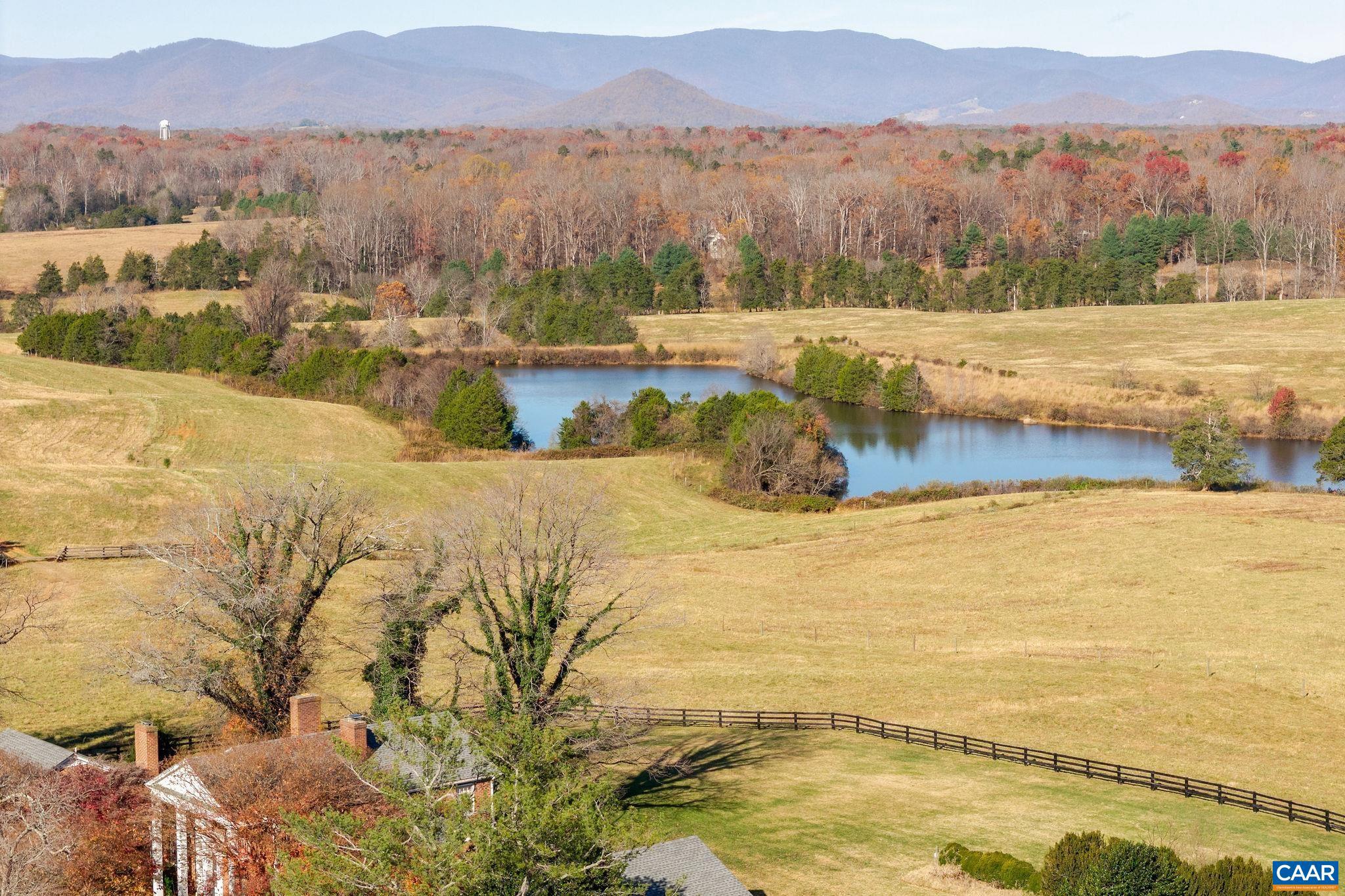 The most significant offering of Albemarle County acreage to reach the market in recent years?529.65 acres with sweeping Blue Ridge Mountain views, over 12 acres of open water across multiple ponds and a lake, and a setting of scale and possibility rarely found this close to Charlottesville.  The property includes two residences and is served by multiple entrances along Earlysville Road, providing flexibility for future use. Open pastures, wooded acreage, and expansive water features combine to create a landscape equally suited for farming, recreation, or a private estate of exceptional presence.  Its location is unmatched?minutes to Route 29 North, NGIC, and the Charlottesville-Albemarle Airport, with quick access to UVA and downtown Charlottesville. A property that offers both privacy and proximity, ready to support the next generation of vision in northern Albemarle.