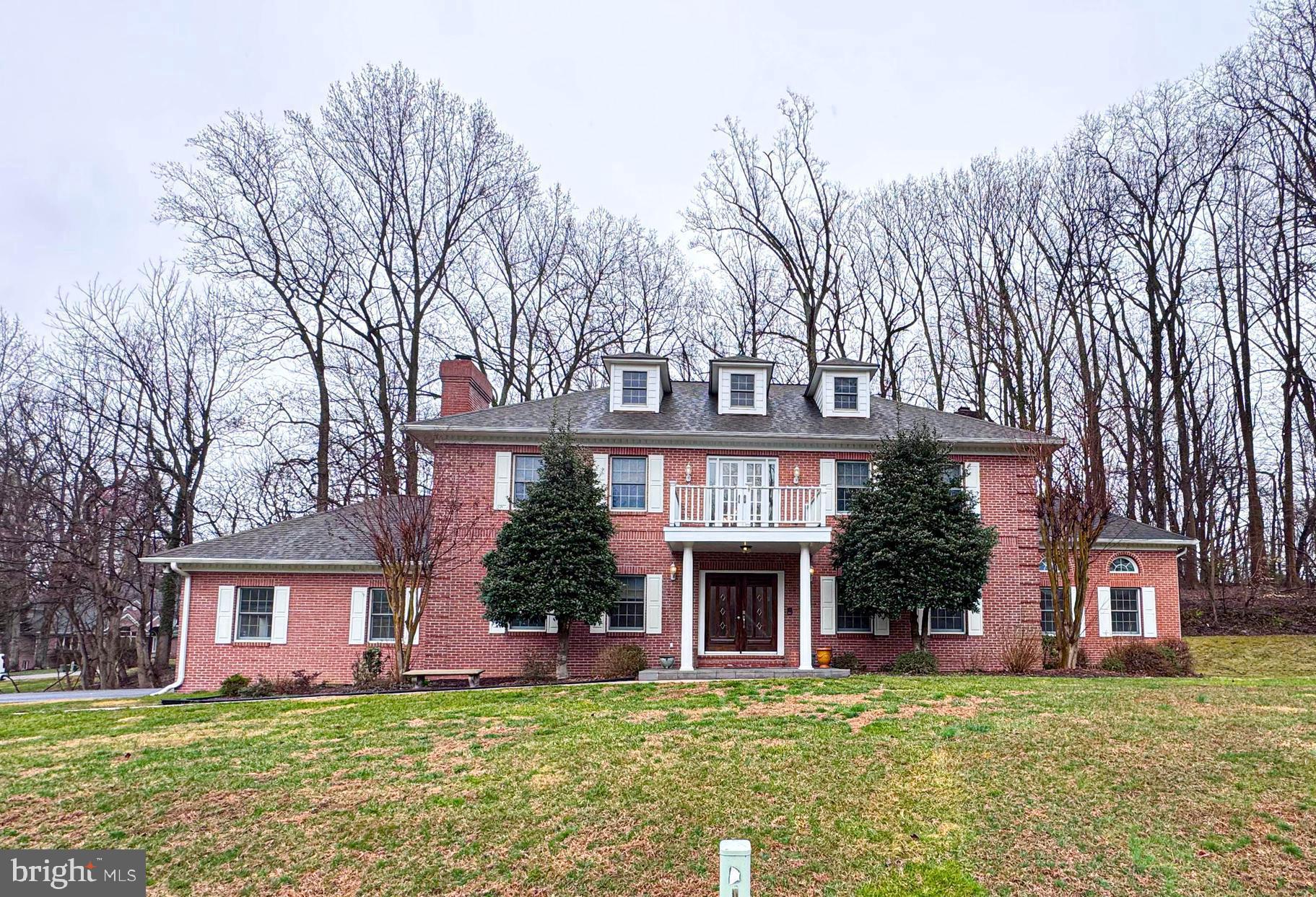 Welcome to 1527 Wild Cranberry Dr., An  Impressive, Truly Gorgeous Colonial distinguished by its tall white pillars and brick exterior. 
The grand entrance with a wide staircase immediately sets the tone, showcasing stunning chandeliers, gleaming hardwood floors, and an atmosphere of sophistication that carries throughout the home. Offering over 4,000 square feet of refined living space, this exceptional residence features five bedrooms and three and a half bathrooms, thoughtfully designed for both elegance and comfort.

Step inside an expansive eat-in kitchen with ceramic flooring that flows effortlessly into the 19X14 family room. The 18X15 dining room creates a seamless space for upscale entertaining and everyday living. 
A second sunroom /study room with double French doors opens to an impressive 1,000-square-foot deck—perfect for hosting unforgettable gatherings or enjoying serene outdoor living.
(Upstairs) The 18x17  primary suite is a true retreat, featuring a custom walk-in closet, double sink, and a spacious, spa-inspired bathroom designed for relaxation and privacy.  Upstairs also offers the 2nd 11X11 bedroom and the 3rd 15X12 bedroom, which features a large closet and shared bathroom.

The fully remodeled, 2026 finished basement in-law suite elevates this home even further, complete with a striking brick wood-burning fireplace, recessed lighting, and two sets of double glass doors leading to a private patio and wooded backyard. The lower level also offers an additional bedroom, a full bathroom with a beautifully appointed marble shower, and a well-equipped laundry room with a washer and dryer. ---heat pump = 500-gallon gas heat backup
- 2-car garage, freshly painted- 12-year-old roof

The seller is offering $10,000 toward settlement costs.