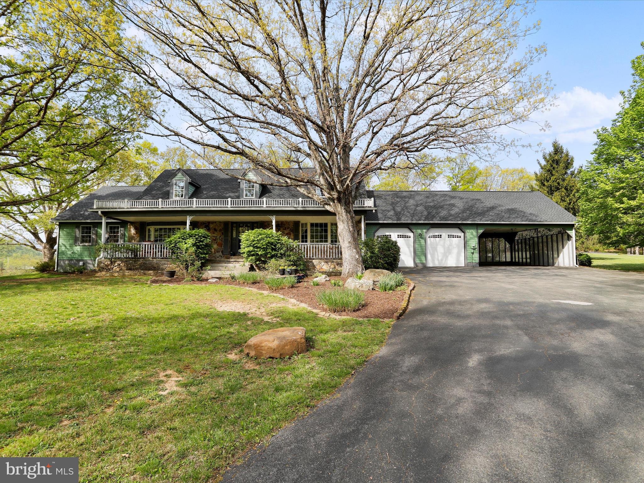 Dreaming of your mountain oasis? Looking for your piece of "Almost Heaven"?  Ready to ditch the hustle and bustle and escape to the mountains?  You can stop your search--you've found it here!  Nestled in the foothills of Appalachia rests 369 Timberlake Drive.  This 5 or 6 bedroom house sits on almost 4 acres of property, boasting more features than words can do it justice.  Whether it be the large level lot, the massive attached garages and carport, the fully finished basement, the HVAC and roof that are barely a year old... the list goes on and on.  There's nothing left for you to do but move in, kick your shoes off, and enjoy the mountain breeze!