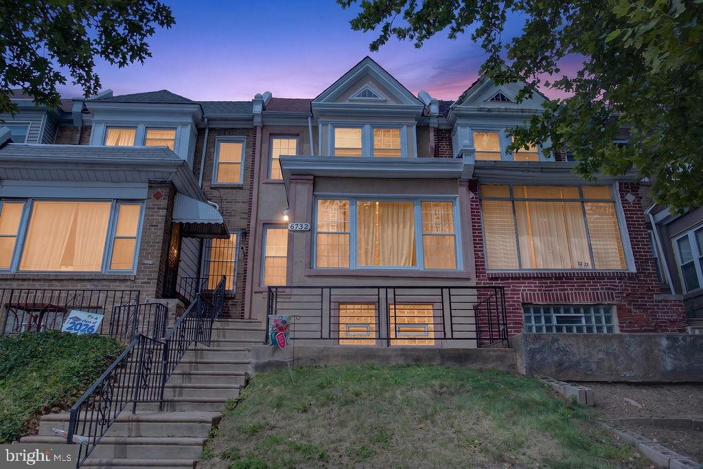 Welcome to 6732 Ogontz Avenue, where modern updates meet timeless charm in the desirable Oak Lane neighborhood of Philadelphia. This move-in-ready home offers the perfect combination of comfort, functionality, and style.

As you arrive, you'll be greeted by a welcoming front patio, ideal for relaxing outdoors and enjoying the neighborhood atmosphere. Step inside the enclosed sunroom, a bright and versatile space perfect for your morning coffee, home office, or cozy reading nook.

The main level features an open and airy living and dining area accented by crown molding, recessed lighting, and a stunning tray ceiling with a contemporary chandelier that serves as the room's focal point. The beautifully updated kitchen is equipped with stainless steel appliances, rich wood cabinetry with under-cabinet lighting, a breakfast bar, and direct access to the rear deck, creating the perfect setup for entertaining family and friends.

The second floor offers three spacious bedrooms with generous closet space, ceiling fans, plush carpeting, and new laminate flooring installed in April 2026. The full bathroom is designed for relaxation, featuring a skylight, deep Jacuzzi tub, ceramic tile finishes, and stylish fixtures.

The finished lower level expands your living space with a large family room, a full bathroom with a walk-in ceramic-tiled shower, and a dedicated laundry area complete with washer and dryer. Additional features include interior garage access and private driveway parking.

Recent improvements provide added value and peace of mind, including a new roof installed in May 2025. Central air conditioning ensures comfort throughout every season.

Conveniently located near shopping, dining, parks, and major transportation routes, this Oak Lane beauty is ready for its next owner.