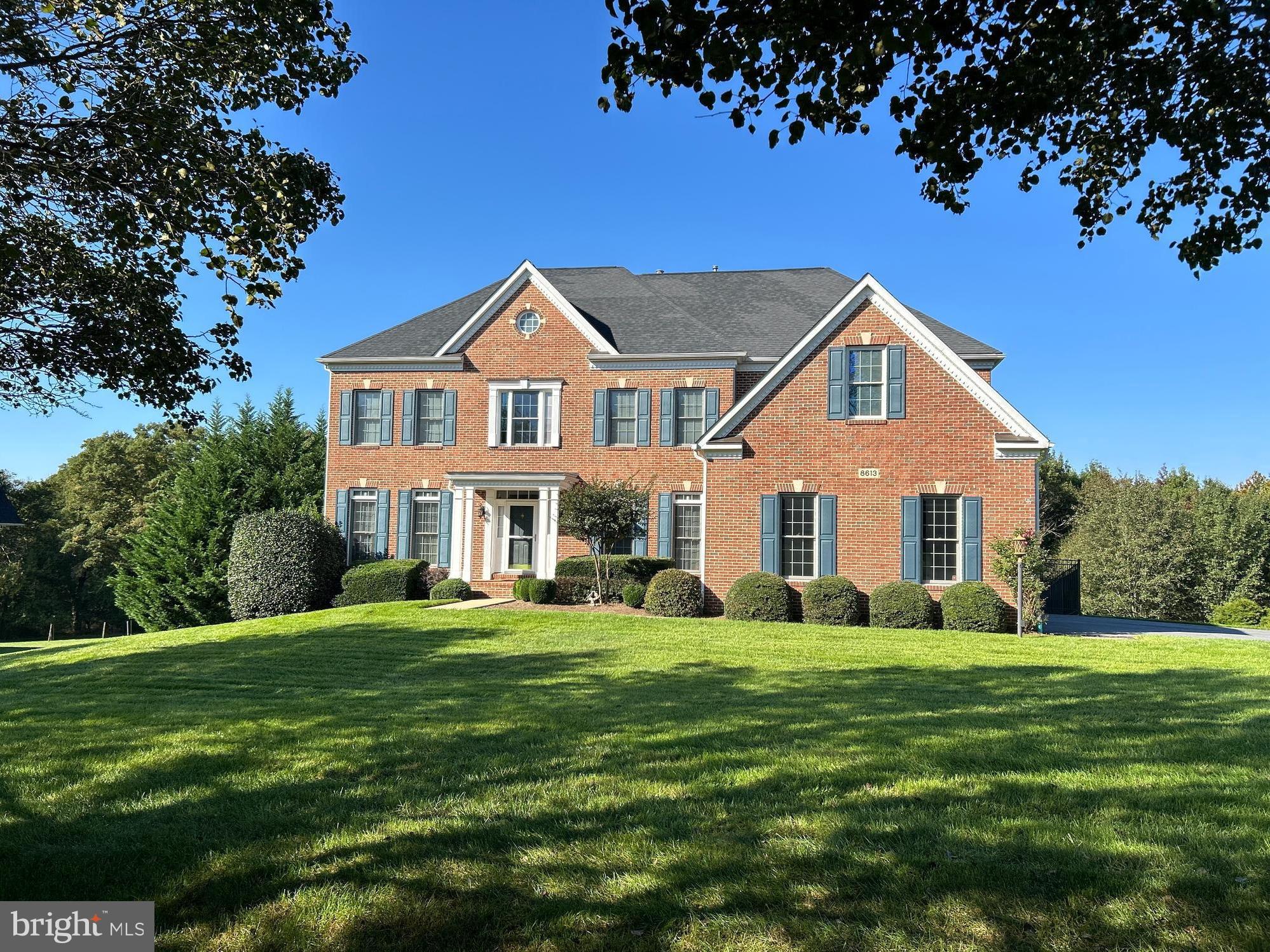 Set on a private, two-acre LEVEL wooded backyard lot, the entire back of the home overlooks a park-like setting, offering stunning panoramic views that change with the seasons. Morning coffee tastes better when watching the sunrise bathe the woods in golden light. 

The gourmet kitchen, remodeled in 2020, is both functional and beautiful. It features custom-built hardwood cabinetry, striking Level 3+ Cosmic Black granite, an Italian Carrara natural stone backsplash, and top-of-the-line Miele wall ovens. The high-end cabinetry also includes a cutting board, cookbook, small appliance cabinets, and coffee and tech nooks. Whether you love to cook or entertain, this kitchen makes it effortless. Two dining rooms are a bonus. The main floor also boasts a large family room with cozy gas logs, an oversized office facing the woods, a half bath, and a spacious living room. Both ACs (upgraded efficiency Bryant units), the furnace, and a Generac generator were replaced in 2022, giving you peace of mind for years to come. The home also features a whole-house water filtration system. Over $275,000 worth of remodeling and upgrades!  

The primary suite is more than just a bedroom—it's a retreat. Its quiet, calming vibe and breathtaking 180-degree views of the woods make it the perfect place to let the day's stress melt away. The suite includes a sitting area, a walk-in closet, and a huge walk-in closet with a closet system and chandeliers. The spa-like bathroom, remodeled in 2020, adds to the experience, featuring a frameless glass shower with three showerheads, a sleek stand-alone soaking tub with a beverage shelf, and upgraded deco tiles. The upstairs also boasts a living room loft, an ensuite bedroom, two other large bedrooms with walk-in closets, a shared remodeled two-vanity bath, a laundry room with a new washer and dryer, and new plush carpeting.   

The bright, sunny walkout finished basement offers even more space to relax and entertain. It has a remodeled wet bar with a dishwasher and a refrigerator that seamlessly adjoins a full bar, a fully technically equipped movie room with a 106" projector screen, and tiered seating for the ultimate cinematic experience. French doors lead to a paver patio, and windows make this basement a sunlit space. A shop area and an ample storage area round out the basement.  

Outdoor living is just as impressive, with a spacious main-level Azek deck and romantic auto-lights at dusk (2019). An additional roll-on / roll-off paver area (2019) gives easy access to the garages (3) from the deck for easy winter storage of furniture and plants. A circular ground-level paver patio with a seat-height wall seamlessly transitions to the beautifully landscaped level backyard. Smart-enabled climate control, motion-sensor closet, pantry lighting, three-car garage Wi-Fi-enabled doors, tech cubbies, and new LED lighting throughout the home add comfort, convenience, and cost savings.  
This beautiful home is more than a house—it's a place where memories are made, everyday moments feel special, and you can truly feel at home. 
Schedule your private tour today and experience it for yourself.