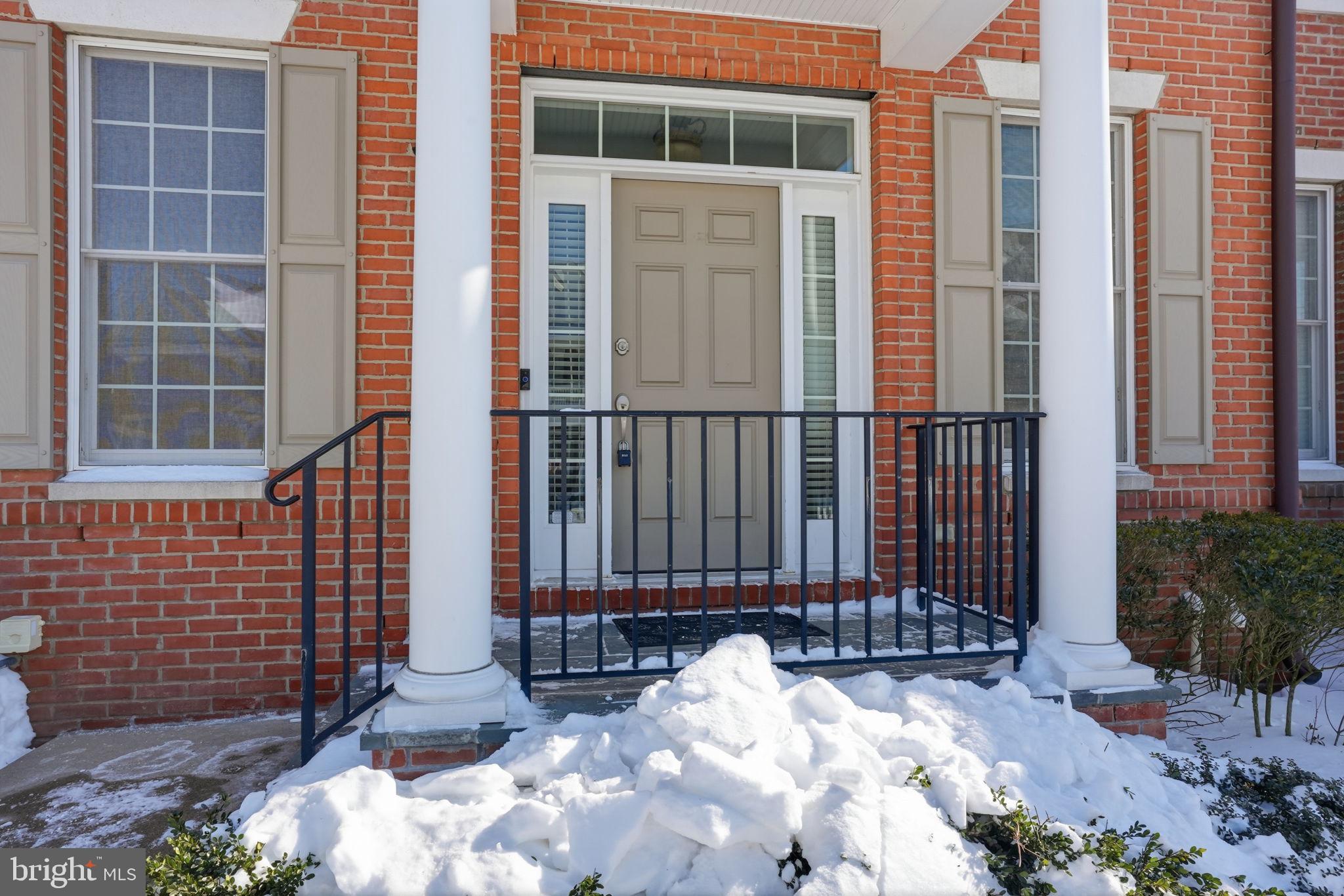 Set within the highly desirable Newtown Walk community, this impressive four bedroom townhouse offers the most expansive floor plan available and an outstanding opportunity for sophisticated, low-maintenance living. Thoughtfully positioned in the center of charming, Newtown Borough, the home spans three fully finished levels designed for both everyday comfort and effortless entertaining.

A bright, welcoming foyer opens to a stylish interior where rich hardwood floors anchor the open living and dining spaces. The heart of the home is the stunning, newly reimagined kitchen, beautifully appointed with a dramatic quartz waterfall island, custom cabinetry, statement backsplash, porcelain farmhouse sink, and a built-in 48" GE Monogram refrigerator. The adjacent family room exudes warmth and personality, featuring a gas fireplace, refined millwork, floating shelving, and integrated surround sound. Glass doors lead to the rear deck, creating a seamless indoor-outdoor connection ideal for gatherings or quiet evenings at home.

A rare and valuable feature of this layout is the main-level guest suite, recently refreshed and tucked into its own private wing, perfect for hosting visitors, multigenerational living, or a dedicated home office.

Upstairs, the serene Owner’s Suite serves as a true retreat with two walk-in closets and a spa-like bath complete with dual vanities and a soaking tub. Two additional generously sized bedrooms and a full hall bath round out the second level.

The third floor offers exceptional versatility and can function as a fourth bedroom, playroom, or secluded workspace. Below it all, the expansive basement with 9 foot ceilings provides remarkable additional space, featuring a cedar closet, rough-in plumbing for a future bath, room for a home gym, and plentiful storage.

Blending scale, style, and flexibility, this exceptional home is located in the award-winning Council Rock School District and just moments from Newtown’s popular dining, boutique shopping, cafés, salons, and top-tier fitness studios.