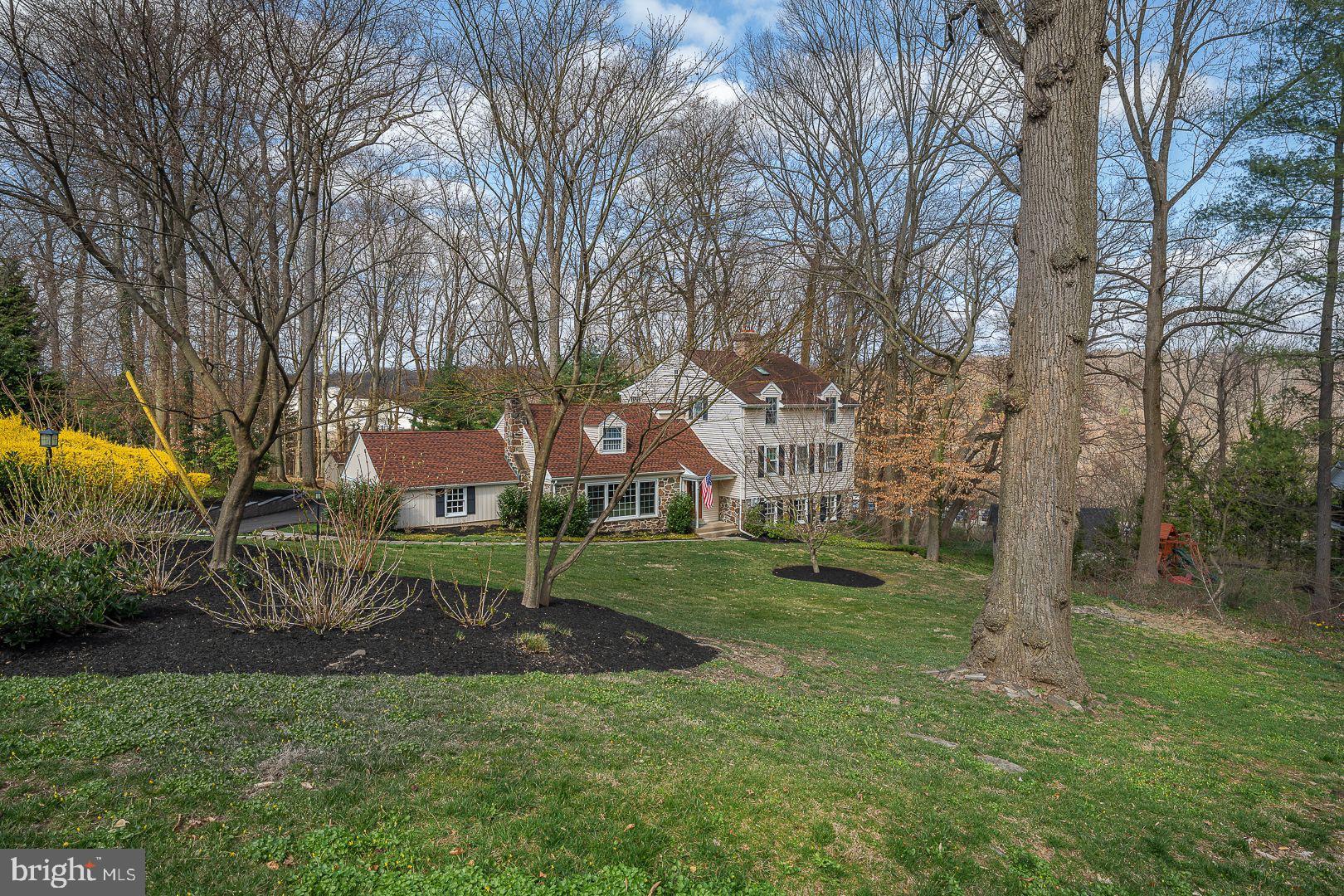 Excellent location at the end of a cul de sac on nearly one acre in Wayne, Radnor Township! Expanded and updated by the prestigious Legnini Company.
The Main Level open floorplan features include a Foyer w/double closet, Living Room w/gas fireplace, large Country Kitchen with an incredible number of cabinets, stainless steel appliances, granite counters, farm sink, an island, pantry, doors to the deck and slate terrace and a mudroom w/cubbies and access to the garage w/only a few steps to the Family Room w/built-ins, a fireplace, Powder Room and another door to the deck and backyard.  Upstairs are 5 bedrooms, a hall bath w/double sinks and granite. The 4th bedroom is ensuite with its own full bathroom. The 5th Bedroom is the huge Main Bedroom Suite w/vaulted ceilings, skylights, bathroom w/double sinks, an oversize shower, whirlpool tub, marble flooring and spacious walk-in closets.  Additional features include the convenient 2nd floor Laundry Room w/a sink, lots of cabinets, a linen closet and plenty of counter space. Beautiful hardwood floors, central air, dual zone heating, gas heat, lovely private grounds w/established plantings and trees, an attached garage.... etc...etc. Move right in!  (