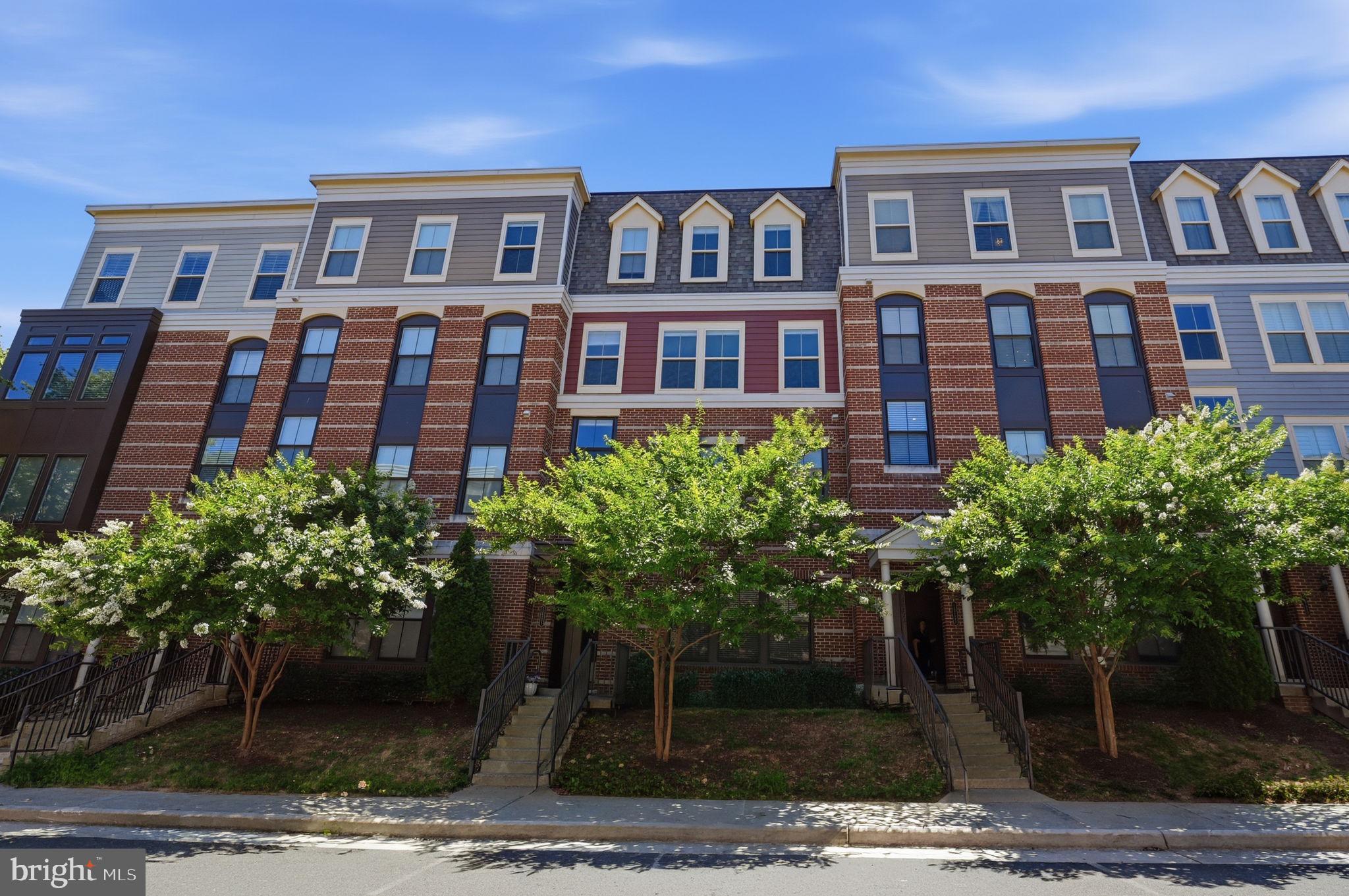 Welcome to 10723 Viognier Terrace, where modern elegance meets absolute comfort. Located in the highly sought after Mount Vineyard community in the City of Fairfax, this stunning two-story townhouse has been meticulously maintained. It shines in pristine, move-in-ready condition from top to bottom.

As you step inside, you are greeted by gorgeous, wide-plank hardwood floors that flow seamlessly throughout the main level. The heart of the home features a beautiful double-sided fireplace, perfectly framing both the cozy family room and the sophisticated dining area. Fall in love with the gourmet kitchen, which boasts an abundance of cabinetry, extensive counter space, and an extra-large center island designed for effortless daily living and vibrant entertaining.

Upstairs, the beautiful hardwoods continue into a versatile loft area, the perfect flex space for a home office, cozy reading nook, or media room. The expansive primary suite is a bright and airy sanctuary, complete with a generous walk-in closet and a luxurious ensuite bathroom featuring a double vanity and a sleek glass door shower. Two additional bedrooms offer comfort and flexibility on the upper level.

Offering an unbeatable blend of style, space, and a premier Fairfax location, this is a rare opportunity you do not want to miss!