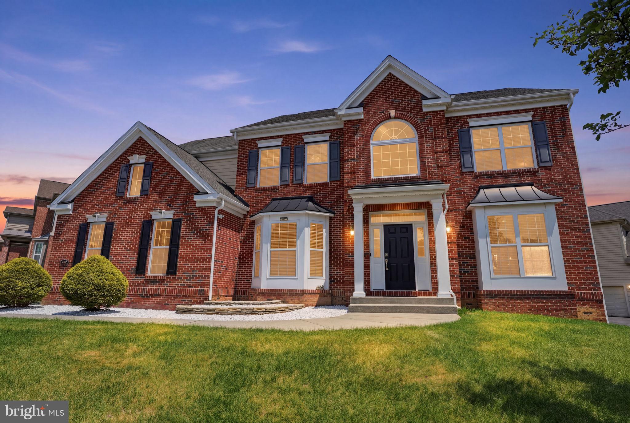 Welcome to this impressive brick-front Colonial nestled on a premium lot backing to the woods, offering privacy, space, and timeless appeal. Boasting nearly 3,800 square feet, this beautifully maintained home features hardwood floors throughout and a layout designed for both everyday living and entertaining.This 5 Bedroom , 3 Full Bathroom home has a lot to offer !Step inside to a dramatic two-story foyer that opens to a soaring two-story family room with a cozy gas fireplace, creating a warm and inviting gathering space. The extra-large morning room fills the home with natural light and provides the perfect setting for casual dining while overlooking the peaceful backyard.The main level also offers a bedroom and full bathroom, ideal for an in-law or guest suite, or the perfect private office space and your formal dining and living room areas. A side-entry garage adds to the home’s curb appeal and functionality.Upstairs and throughout, the home offers generous living space and a thoughtful floor plan to suit a variety of needs.The main suite features tray a ceiling, sitting area , his and hers walk in closets and private bath with soaking tub ,shower and his and her vanities. The full-size basement is ready for your vision—whether you’re dreaming of a home gym, media room, playroom, or additional living space, the possibilities are endless.Set on a desirable lot in a sought-after location, this home combines size, style, and setting in one exceptional package.