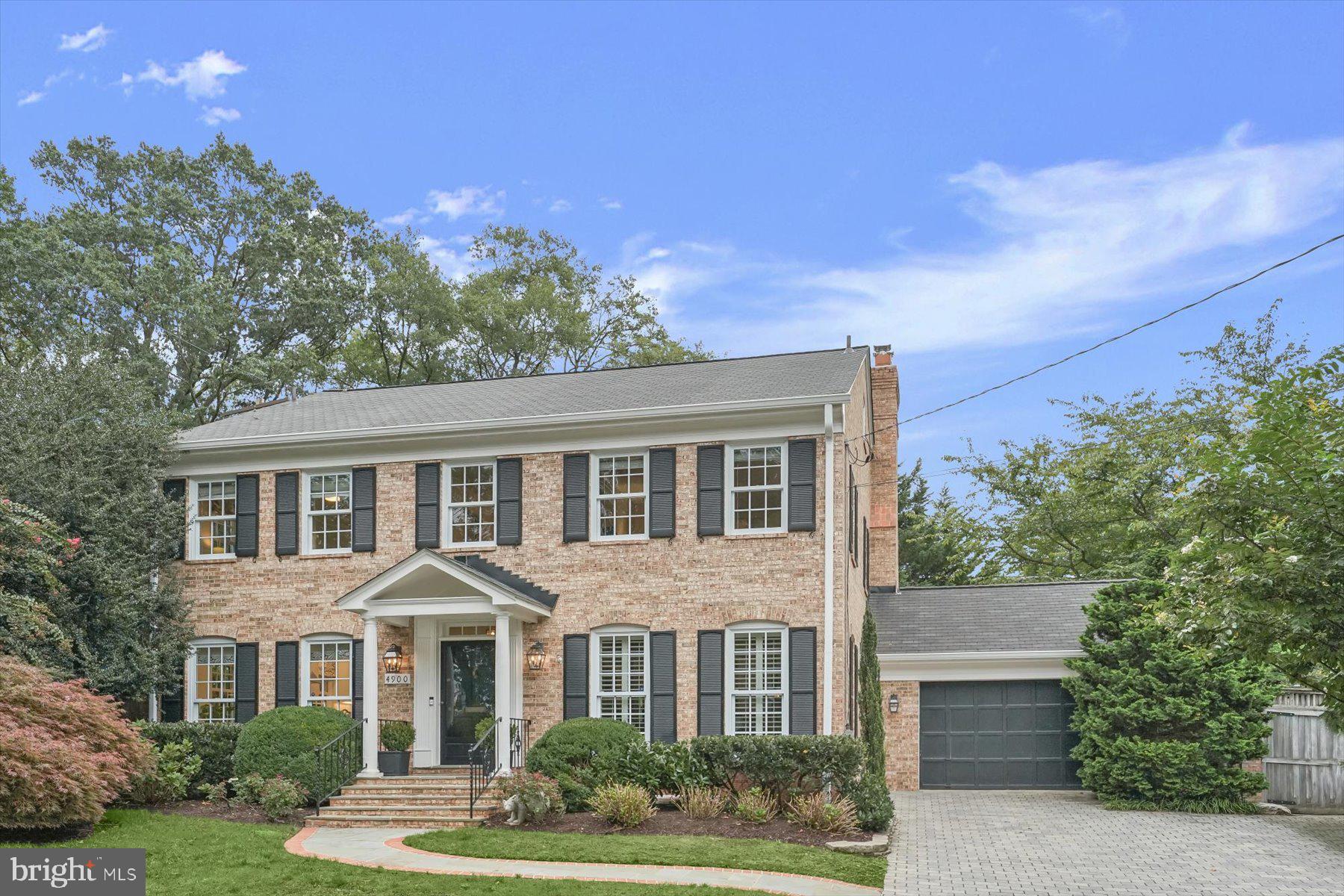 Ideally located in Kent, this happy brick home has beautiful updates that effortlessly combine everyday comfort with elegant entertaining.
Step into a welcoming foyer that opens to sun-filled living areas, perfect for hosting or relaxing. The updated chef’s kitchen is equipped with top-of-the-line appliances including a Wolf range, Sub-Zero refrigerator, wall oven, and built-in microwave (all replaced in 2025). The kitchen flows into the bright family room, creating a warm and inviting atmosphere for both casual and formal living spaces. 
The upper level features generously sized bedrooms, including a luxurious primary suite with an updated bathroom (2025), a fireplace, and two walk-in closets. A thoughtfully updated Jack and Jill bathroom (2024) serves two additional bedrooms, while Bedroom 4 enjoys its own updated en-suite bathroom (2020). A convenient laundry closet with a washer and dryer replaced in 2021 adds practicality to the upper level.
The lower level offers flexibility, featuring a fifth bedroom with a new Pella window and window well (2025), perfect for guests, a home office, or au pair suite. An updated full bathroom (2021) and a spacious recreation area with two additional windows and a wood burning fireplace round out this highly functional space.
Outside, the large flat yard includes a serene stone patio, while the front and side yards are serviced by an irrigation system for easy maintenance. The stone paver driveway (2018) adds curb appeal and leads to an upgraded garage (2023) featuring confetti flooring, organizational shelving, and a smart opener system with new track, keypad, and remotes (2024).
Other notable upgrades and improvements include an architectural shingle roof (2025), new gutters and downspouts (2025), eight new Pella windows along the back of the home (2025), and a recently installed water heater (2023).  
Set in one of DC’s most desirable neighborhoods, this home is inbounds for Mann, Hardy, and MacArthur schools. It’s located just blocks away from parks and has easy access to retail shops, major commuter routes, the Capital Crescent Trail, and Sibley Hospital.