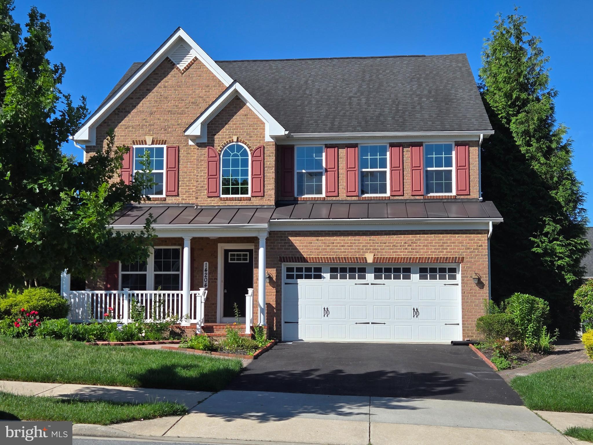 Welcome to this wonderfully maintained single-family home, built in 2014, which perfectly combines modern comfort with everyday convenience. Spanning an 3,727 square feet of total living space, this expansive property features four bedrooms, three and a half bathrooms, and an attached front-entry two-car garage. Inside, you'll discover a bright, open, and airy layout. The main level showcases a sunlit living area that transitions effortlessly into a contemporary kitchen, making daily living and entertaining enjoyable. Upstairs, the four generously sized bedrooms offer ample quiet and private space. The lower level expands your living options with a fully finished walkout basement, ideal for a recreational room, home gym, or office. Situated on 0.18-acre lot, the home includes a cozy interior fireplace, perfect for chilly evenings, as well as a deck off the interior sunroom, ideal for summer gatherings. The location is a commuter's dream, just minutes from the I-95 corridor, providing quick and easy access to Washington, D.C. and Baltimore, MD.