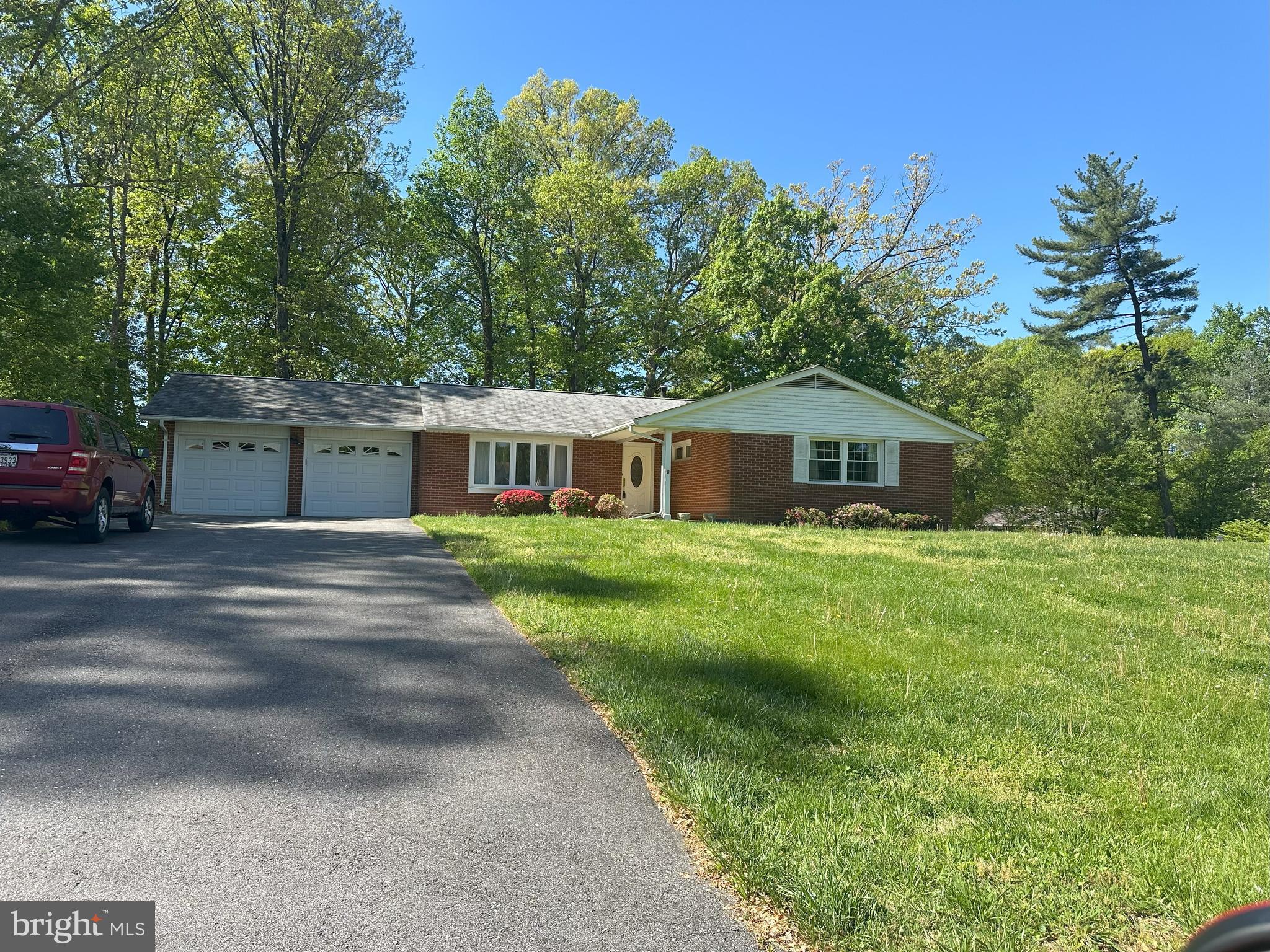 Looking for a prime Howard County location and the chance to create your dream home? Opportunity knocks! This solidly built, original-owner home sits on a spacious 0.6-acre level corner lot, offering plenty of potential for renovation and customization. While the home may need a cosmetic makeover, it has great bones, with hardwood flooring under the neutral carpet on the main level, the roof is 6-8  years old, HVAC is 2 years old , water heater 2 years old, the siding has been replaced, and the unfinished basement is ready for your vision! This is an "AS-IS" sale—the seller is unable to make repairs—but the possibilities are endless! Located in Hammond Village, just minutes from Maple Lawn, you’ll enjoy convenient access to shopping, dining, parks, and top-rated schools. Major commuter routes—including I-95, US-29, and Route 216—are just moments away. No HOA! Don’t miss this rare chance to transform a well-loved home into your own masterpiece in a highly desirable location! Septic and water city ( to be verified by the buyer)