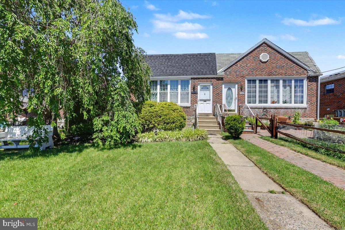 Welcome to 8512 Frontenac Street, a beautifully maintained brick semi-detached home nestled on a quiet street in the highly desirable Bells Corner neighborhood of Northeast Philadelphia. Combining classic charm with thoughtful modern updates, this move-in-ready home offers comfortable living, functional spaces, and a convenient location. A charming front patio welcomes you and provides the perfect spot to relax outdoors. Inside, you'll find a bright and spacious living and dining area featuring stylish wood-look flooring, neutral décor, and an open layout that creates a warm, inviting atmosphere. The expansive family room offers plenty of space to gather and unwind, while the dining area is filled with natural light from a wall of windows and accented by a contemporary chandelier. The updated kitchen is both attractive and practical, boasting 42-inch cream-colored cabinetry, granite countertops, ceramic tile flooring, recessed lighting, and a full suite of newer appliances, including a gas range, built-in microwave, dishwasher, and French-door refrigerator. A convenient side-yard exit makes outdoor grilling and entertaining easy.
The main living level also features three generously sized bedrooms with ample closet space and a full hall bathroom with a tub/shower combination.
Downstairs, the fully finished lower level significantly expands the home's living space. Complete with recessed lighting and a beautiful stone fireplace, this versatile area can serve as a second family room, playroom, home office, gym, or guest retreat. A recently remodeled powder room adds extra convenience. You'll also find a dedicated laundry and mudroom with a utility sink, additional storage, and direct access to the rear driveway and attached garage, providing valuable off-street parking.

Additional improvements include newer windows, roof, boiler/heating system, and fresh paint throughout, offering peace of mind and long-term value.

Ideally located near parks, schools, shopping, and major roadways, this home provides easy access to Center City Philadelphia, surrounding suburbs, and New Jersey.