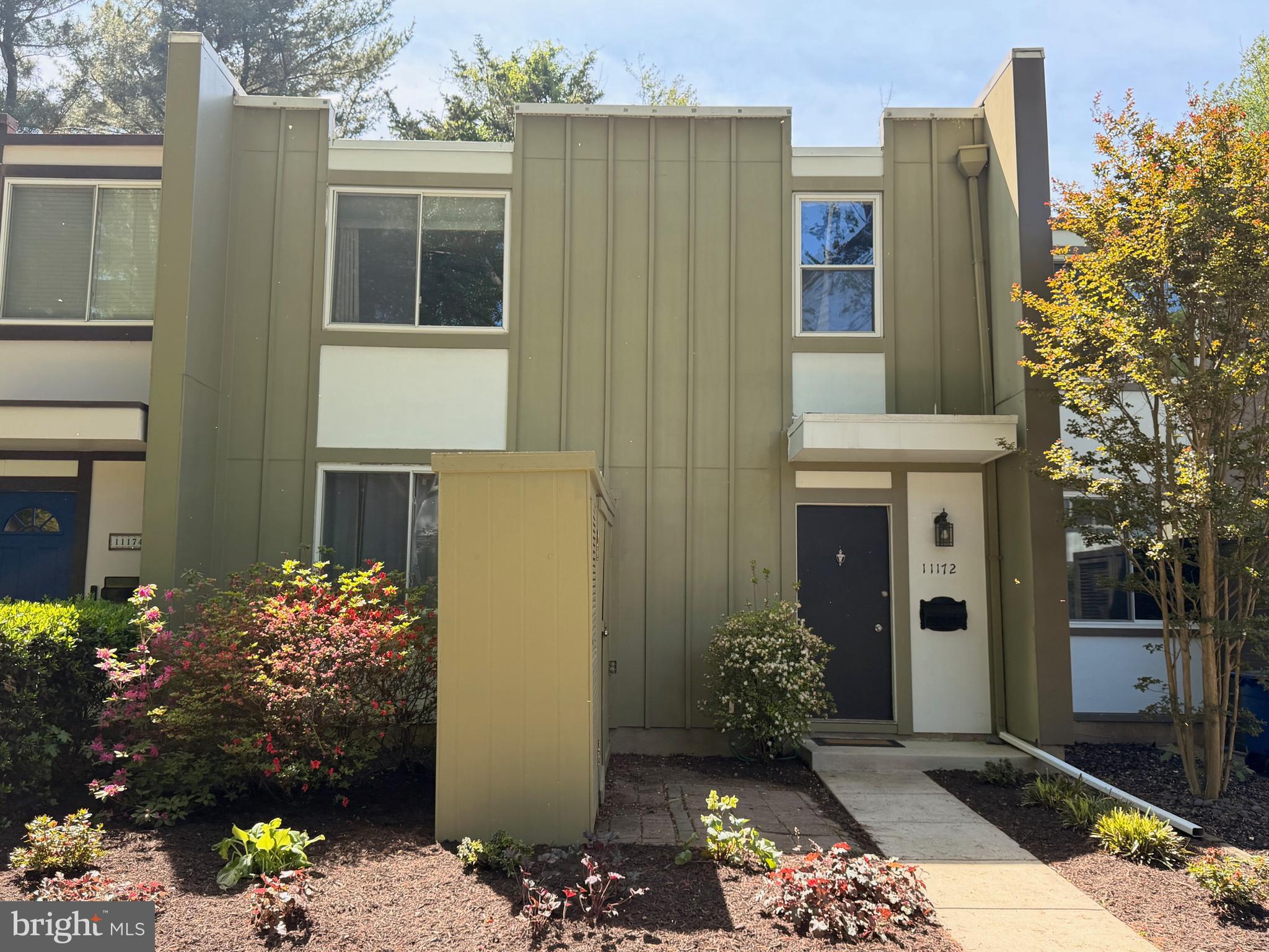 Tucked among the mature trees and natural beauty that make Reston so special, this beautifully updated townhome offers the perfect blend of style, comfort, and convenience. Featuring 3 bedrooms, 3 full baths, and 1 half bath, the home also includes a versatile lower-level bonus/flex space with an adjacent full bath—ideal for guests, a home office, gym, or additional living area. Backing to trees, the home offers a peaceful, private setting that enhances the feeling of living immersed in nature.

Freshly painted throughout, the home showcases a stylish mid-century modern influence with updated lighting fixtures, recessed lighting, and thoughtfully refreshed interiors that create a warm, inviting atmosphere. The updated kitchen features refreshed cabinetry, granite countertops, and gas cooking, while the full baths and half bath feature updated vanities, mirrors, and lighting. Major system updates include HVAC replacement in 2024, Aprilaire whole-home dehumidifier installed in 2022, and a tankless hot water heater installed in 2025.

Enjoy the lifestyle Reston is known for with miles of walking and biking trails, multiple community pools, scenic lakes, tennis courts, parks, and abundant green space just outside your door. Lake Anne Plaza—just approximately a 0.5 mile walk away—offers local shops, restaurants, coffee spots, waterfront dining, and community events. Spend weekends enjoying the lake lifestyle with paddle boat, single kayak, tandem kayak, and stand-up paddle board rentals available right at Lake Anne Plaza. Lake Fairfax Park is also located approximately 2 miles away, offering additional outdoor recreation opportunities.
Reston Town Center, Trader Joe’s, Wegmans, and countless dining, shopping, fitness, entertainment, and everyday convenience options are all located less than 3 miles from the home.

Commuters will appreciate the ideal location just minutes to the Dulles Toll Road, with the Wiehle-Reston East Metro Station, bus stops, and commuter lot all located less than 2 miles away, providing convenient access to Tysons, Arlington, DC, and beyond. A rare opportunity to enjoy updated living surrounded by nature in one of Northern Virginia’s most beloved communities.