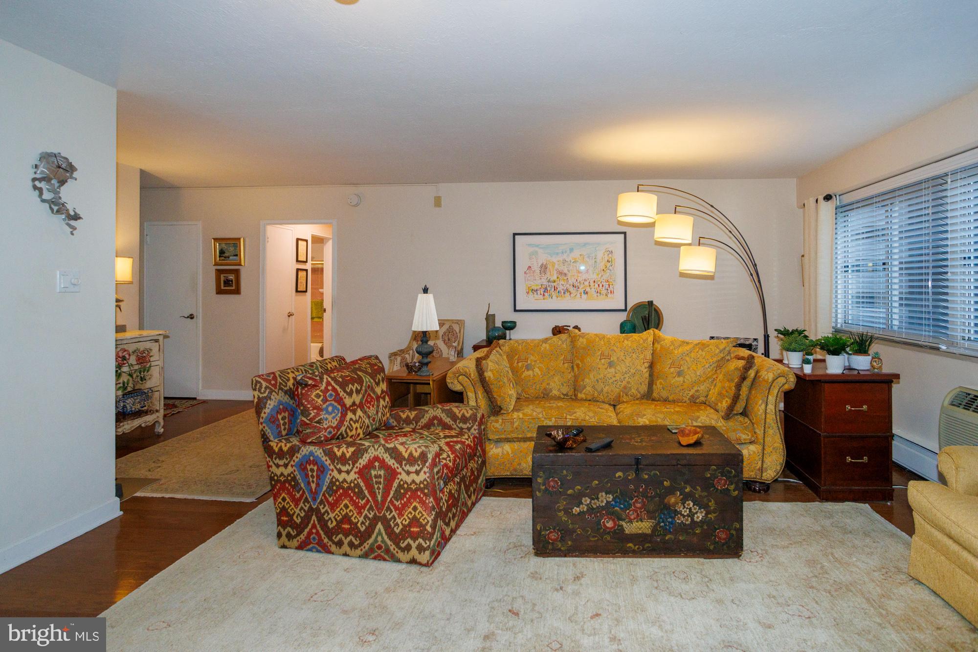Rare opportunity to own a two-bedroom Co-op at Penn Center House with TWO BATHROOMS at a very reasonable price for the Rittenhouse/Logan neighborhoods. This home is a combination of two original units including a large one-bedroom, and a junior one-bedroom. The home has large scale rooms, ample windows and it faces south for great light. There are two entrances that lead into a large open living room with a dining room area. The kitchen is opposite the dining room, and it has been fully renovated with quartz countertops, stainless steel appliances and custom contemporary white cabinets. The original second kitchen has been converted into an office, laundry, and storage room. One of the bathrooms was fully renovated with a stall shower and framed glass doors. The second bathroom has partially updated. There are a lot of closets and storage spaces, including two large walk-in storage closets. The monthly co-op fee includes heat, air conditioning, electricity, water, basic cable, real estate taxes and building maintenance service. Owners praise the maintenance staff, which does nearly all the repair work within owner’s units. The building has 24-hour access control, a door attendant, on-site 24-hour maintenance staff, management office, fitness center, community room, library, roof-top deck, guest suites and common laundry room. The fitness center has an annual fee of just $125. There is an on-site parking garage available  for $145 per month, which is one of the best deals in Center City. The Penn Center House is located just a few blocks off Rittenhouse Square, which has some of the best restaurants, shopping, and nightlife in the city. Trader Joe’s is a 2 block walk and Giant grocery store is 4 blocks. There are many public transportation options within a few blocks. The Suburban train station is a block from the building and Amtrak’s 30th Street Station is just a few blocks walk. There are multiple bus routes within a block of the building. The Schuylkill River trail, museums, University of Pennsylvania, Drexel University and Children’s Hospital are all within easy walking distance.