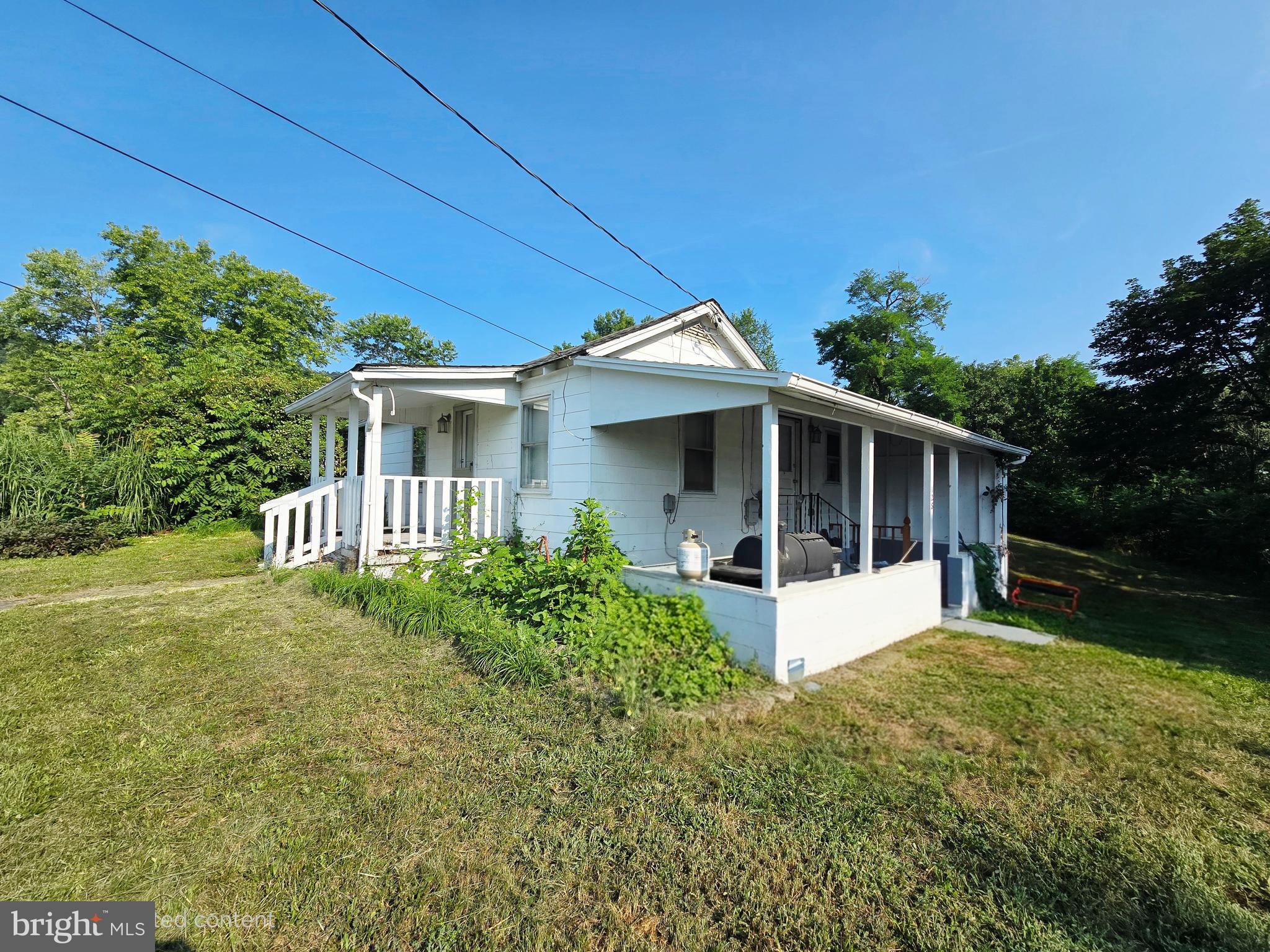 Welcome to 128 Clearview Ave in Wiley Ford, WV! This charming 2-bedroom, 1-bath home is full of potential and sits on a spacious lot, offering plenty of room to enjoy the outdoors. Inside, you’ll find the convenience of main-level laundry and a comfortable layout that makes everyday living easy.

A detached garage provides great storage or workshop space, while the location is hard to beat—just minutes from Cumberland, MD and quick access to Interstate 68 for commuting or travel.

Whether you’re searching for your first home, downsizing, or looking for an investment property, this home is a wonderful opportunity in a desirable location.
