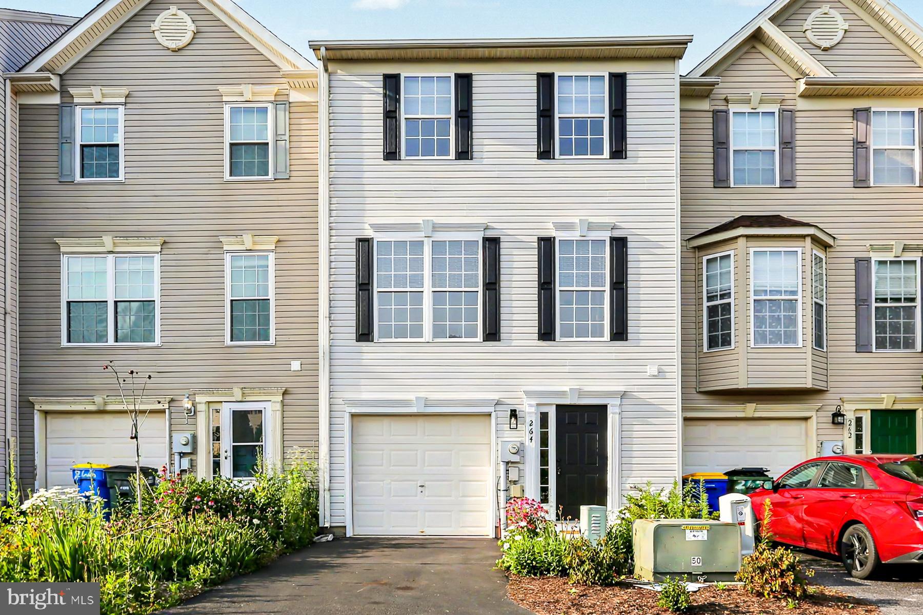 Welcome to this newly remodeled 3-bedroom, 1.5-bath townhouse! Completely move-in ready, this home features fresh paint, brand new carpet throughout, and a brand new roof. The beautifully updated kitchen showcases brand new luxury vinyl plank flooring and stunning granite countertops. Enjoy the open and inviting layout on the main floor, perfect for everyday living and entertaining. Upstairs, you'll find three nicely sized bedrooms and a full bath. The lower level offers a versatile bonus room, perfect for a home office, playroom, or den. The attached garage provides added convenience and extra storage space, while the rear deck overlooks the private, semi-fenced backyard. Don't miss this opportunity to own a beautifully updated home in a convenient location!