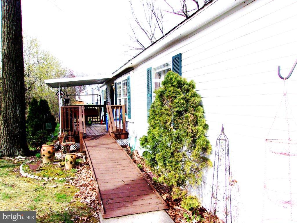 LOVELY , PEACEFUL SETTING FOR THIS AFFORDABLE HOME, 1 STORY LIVING, 2 DECKS OVERLOOKING COUNTRYSIDE, NEW BATHROOM, NEW FRONT DOOR, NEW CARPET IN 3RD BEDROOM AND NEW VINYL FLOORING IN LAUNDRY ROOM, DISHWASHER - 2018, DRYER - 2018.