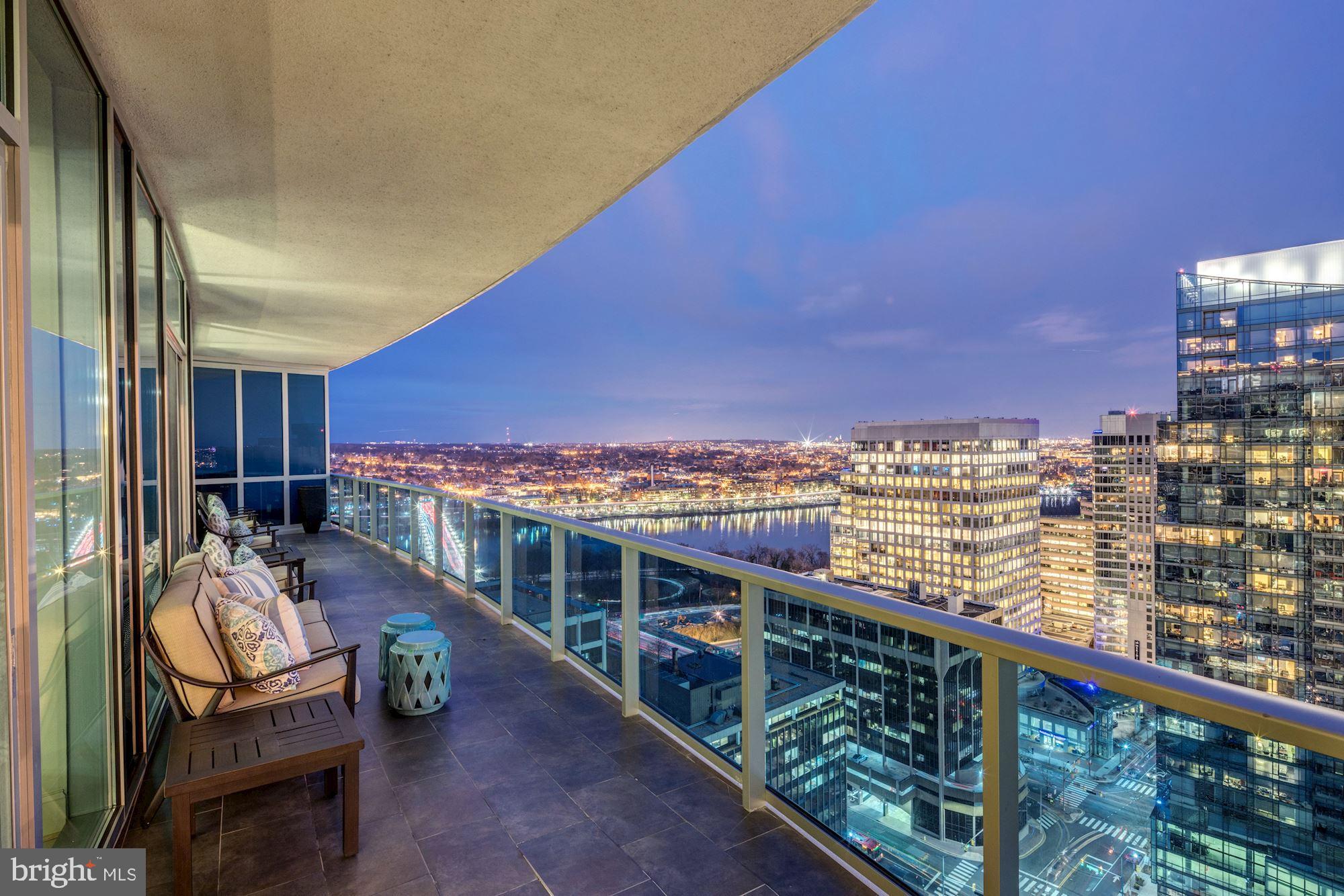Spectacular penthouse unit at Turnberry Tower with amazing views of the city and a total of 4,447 sq/ft make this space perfect for entertaining . Includes private elevator which enters directly into Foyer, open Kitchen/Family Room, expansive Living Room/Dining Room,  beautiful Master Suite, 2 spacious Bedrooms w/ En-suite Baths, Office w/ a view, & Exercise Room. 2 wrap-around Terraces w/ breathtaking views of the Key Bridge make this unit complete. Amenities include: 24-hr concierge, valet, exclusive spa & fitness center.  Unit comes with 2 car grg. parking spaces and storage.  Truly a must see!