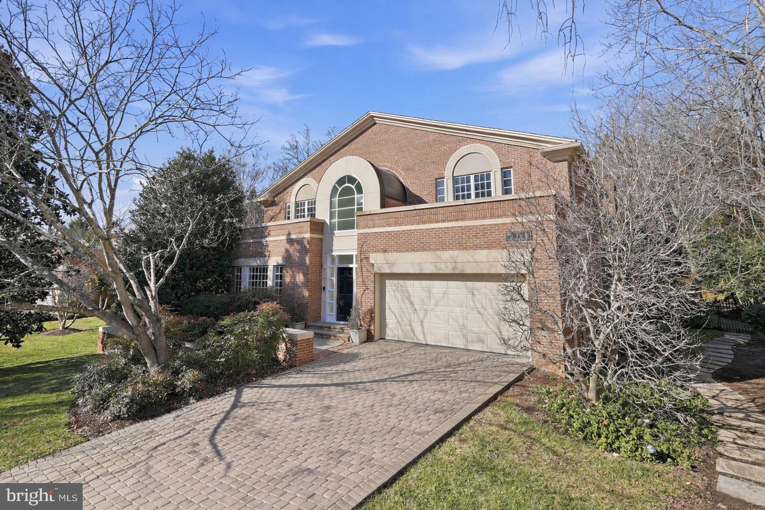 NEW ON MARKET!!! 
 Nestled in the prestigious Avenel community of Potomac, this contemporary residence blends timeless architecture with refined comfort. Built in 1990, the home features three spacious bedroom suites, each with its own private bath, including a sought-after main-level primary suite with a luxurious marble bathroom. Note there is also a fantastic upper level primary suite too! 

Step inside to soaring two-story ceilings that flood the home with natural light and create a dramatic yet inviting atmosphere. Two fireplaces anchor the living spaces, offering warmth and elegance for both everyday living and entertaining. Thoughtfully designed interiors flow seamlessly to the outdoors, where a flagstone patio overlooks a beautifully tiered backyard—perfect for relaxing, hosting gatherings, or enjoying serene wooded views.

Residents of Avenel enjoy access to resort-style amenities including swimming pool, tennis courts, and beautifully maintained common areas, all within minutes of Potomac Village and major commuter routes. This exceptional property offers the perfect balance of privacy, sophistication, and community living.
