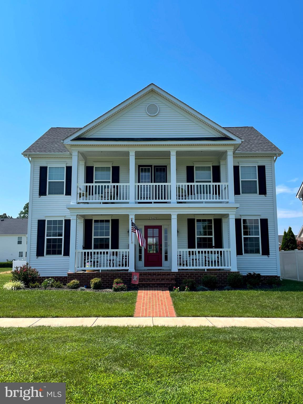 In past times a red door meant welcome – WELCOME to 23620 Pine Bluff Way!  This beauty sits in the heart of the village green in the sought-after community of Leonard’s Grant.  Welcome friends, chat with neighbors, greet 100’s of trick or treaters, watch the community activities or just relax, all from one of the TWO front porches!  Inside there are three levels - 5 bedrooms, 3.5 baths, dining room, living room, family room with fireplace and additional living space downstairs in the fully finished basement.  The kitchen with a large center island, double wall ovens, gas cook top, can host large gatherings or cozy at home dinners with ease.  Out back grill on the patio or exercise on the trampoline (it conveys if you would like) in the fenced back yard.  There is a two-car garage, parking for four cars in the driveway and additional guest parking around the village green.  Walk to the pool, elementary school, local library or catch the trolley to downtown Leonardtown, all minutes from this desired location.   The upgrades this home offers are – hardwood floors, trimmed windows (all), crown molding, vaulted primary suite with large shower (two shower heads) and separate soaking tub.  Recent updates include – new upstairs AC unit, new carpet upstairs, new stainless microwave, kitchen faucet and garbage disposal.  Well loved, well lived, WELCOME home!