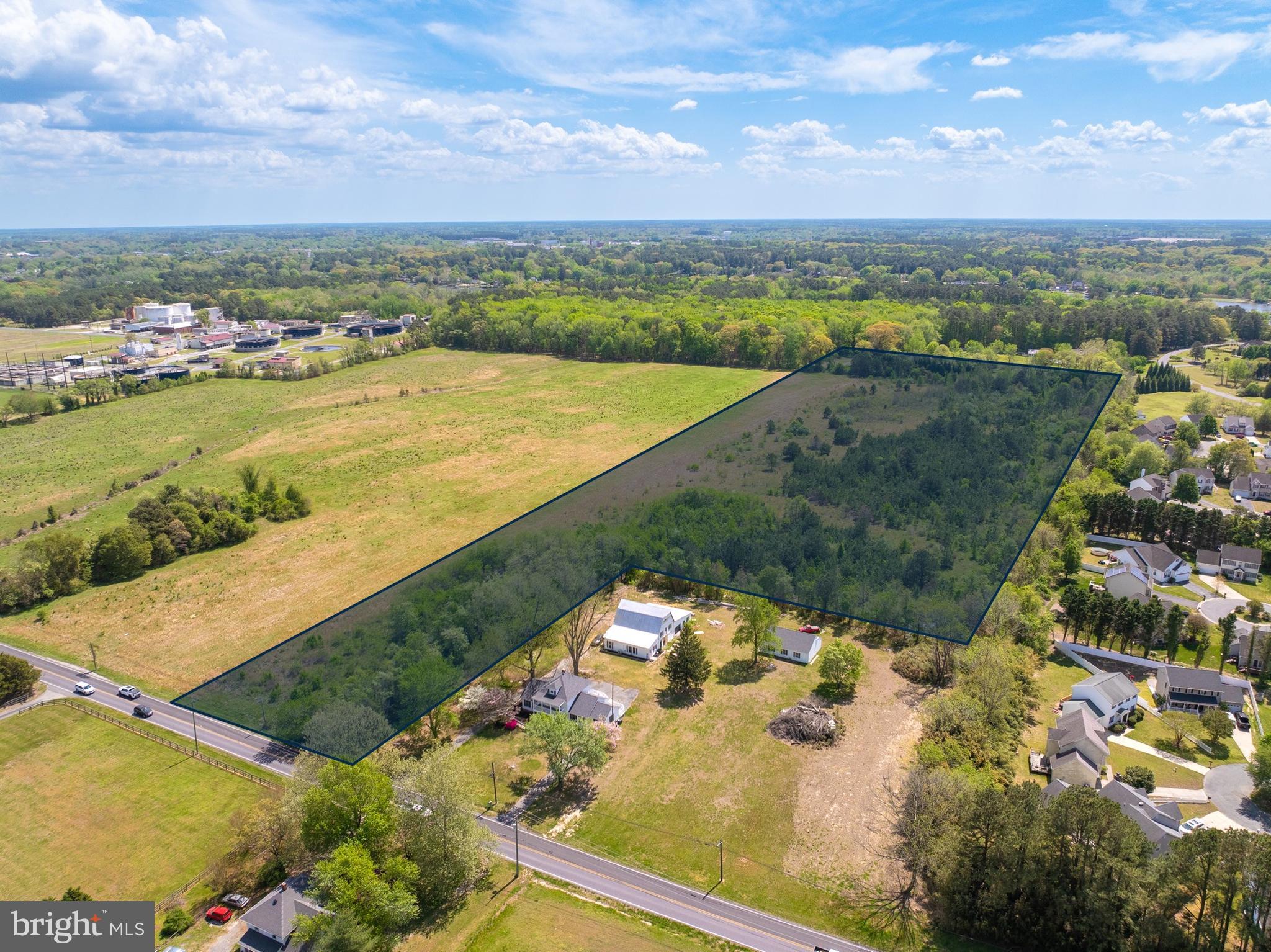 Millers Edge represents a rare, turnkey development opportunity in the City of Salisbury, Maryland. This 16.59-acre unimproved parcel is fully entitled for residential development, offering an incoming developer the ability to move from acquisition to active construction within 30 days. The seller has completed an exceptional level of pre-development due diligence — eliminating the risk, time, and cost typically associated with the entitlement process. A full set of construction drawings is available for current layout. The approved site plan encompasses 153 residential units under the R-8A zoning designation. Alternatively, a minor plan redesign — estimated at approximately 30 days — would increase the unit count to 165 units by right under current zoning, providing immediate value-add upside for an experienced developer. Per the zoning code, various styles of multifamily are permitted including duplexes, townhomes, apartments, and single family.