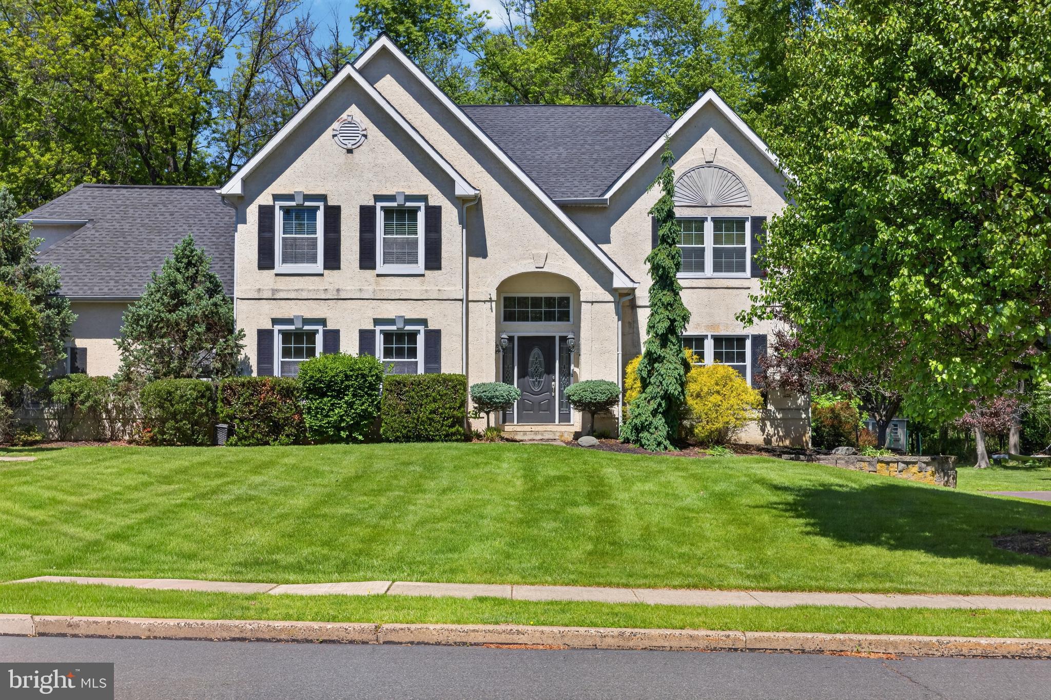 Welcome to this bright and spacious 4-bedroom, 2.5-bath single family home located in the North Penn School District. Surrounded by mature trees and offering a peaceful setting, this home combines classic charm with functional living spaces perfect for everyday living and entertaining.
The main level features a welcoming living room, a formal dining room accented with crown moulding and chair rail, and a spacious eat-in kitchen (renovated in 2016) designed for both convenience and gathering. The kitchen offers a center island, pantry, abundant cabinet and counter space, and sliders leading to a large new rear deck (2022)  overlooking the private backyard. Just off the kitchen is a cozy sitting room with a wood burning fireplace, creating the perfect space to relax and unwind. A convenient half bath completes the main floor.
Upstairs, the home offers four generously sized bedrooms and two full bathrooms, including a spacious primary suite. Natural light fills the home throughout, enhancing the open and airy feel.
Step outside to enjoy the large backyard surrounded by mature trees, providing privacy, shade, and a beautiful natural backdrop for outdoor entertaining or peaceful evenings at home.