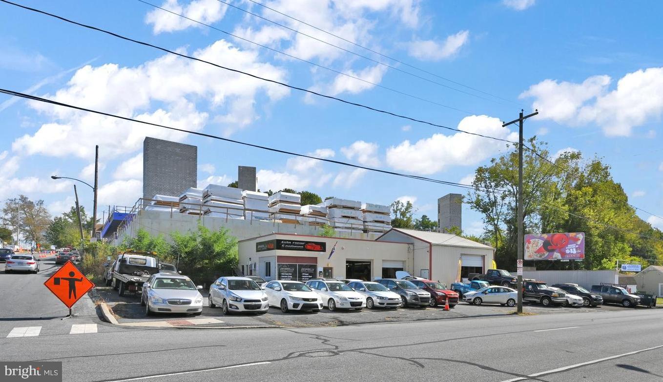 Prime commercial frontage on Lancaster’s busy South Prince Street makes this a high‑visibility, high‑traffic income opportunity for investors seeking an operational auto business with built‑in upside. The property includes the active business, equipment, and real estate, delivering immediate cash‑flow potential from day one.  This parcel contains a fully functioning Auto Repair/Body/Paint Shop. The shop has 3 separate bay doors, office waiting area, 20+ parking spaces, and approximately 2,300 square feet of work and service space.  There is a designated paint area for body repairs.  Business conveys with the sale of the real estate.  The site is currently undergoing renovations to the office, customer waiting area, and restrooms, positioning the next owner to step into a cleaner, more modern, more professional operation without absorbing the renovation downtime. Once complete, the refreshed interior will elevate customer experience, streamline workflow, and strengthen long‑term profitability. With strong exposure, easy access, and an established customer base, this is a true turn‑key automotive operation ready for seamless transition or expansion into service, sales, detailing, or related revenue streams. A rare chance to acquire a performing Lancaster commercial asset with renovations already in motion and multiple paths for growth. Reach out today to schedule a private showing.