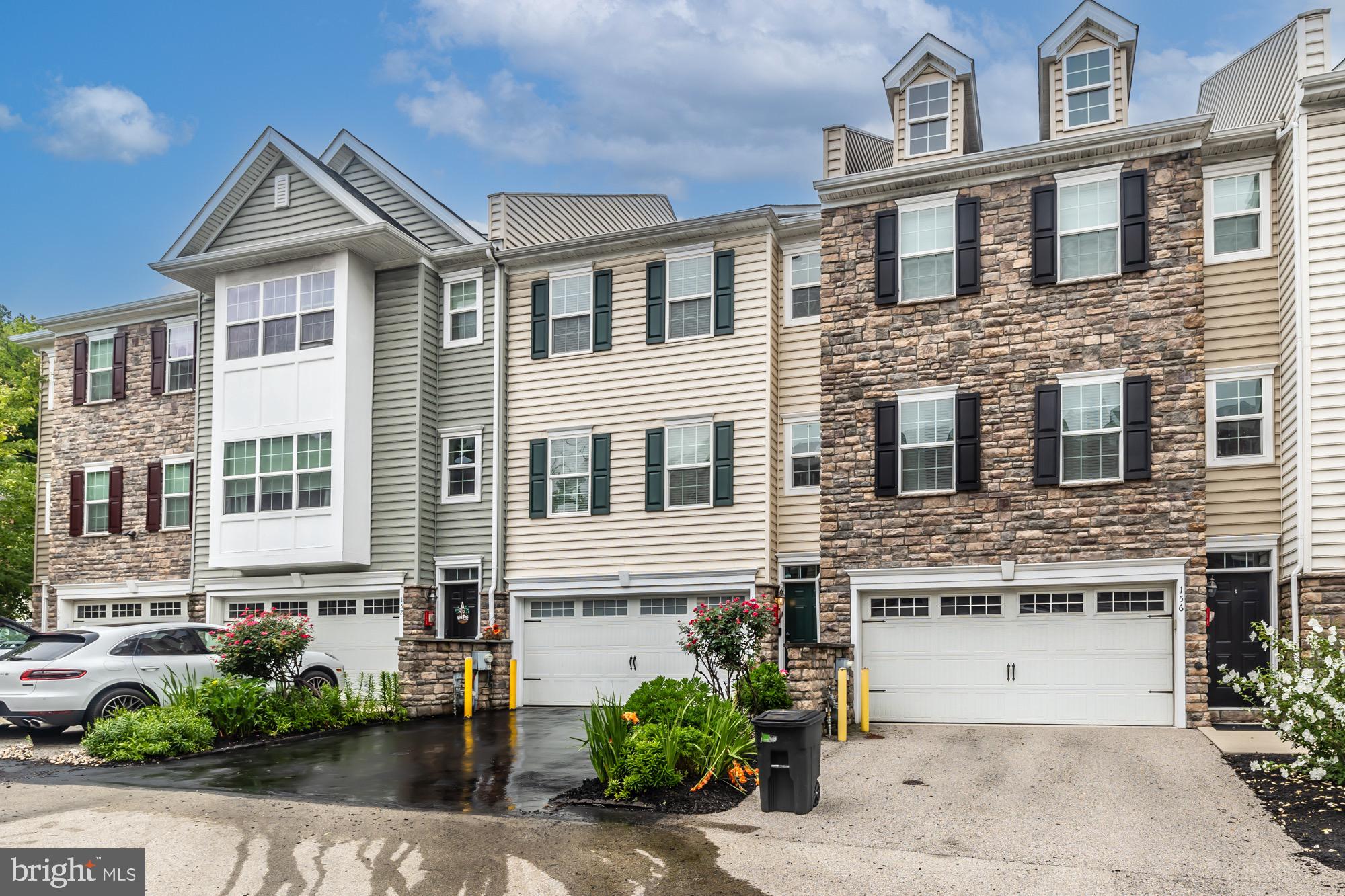 ** Showings start 7/09/26 ** Ask for Video Tour ** Home equipped with numerous builder upgrades ** Welcome to an impeccably maintained townhome offering sophisticated living in one of West Conshohocken's most desirable locations. Perfectly positioned to enjoy everything Conshohocken offers, this home places you just minutes from acclaimed restaurants, boutique shopping, parks, walking trails, and SEPTA regional rail service. With convenient access to major highways, King of Prussia, the Main Line, and Center City Philadelphia, commuting and weekend adventures are equally effortless. Thoughtfully designed across three spacious levels, this exceptional residence blends timeless style, everyday comfort, and effortless functionality. Upon entry, you'll find a bright and versatile lower-level family room, bathed in natural light and featuring sliding glass doors that open to the outdoors—an ideal space for a media room, home office, fitness area, or guest retreat. The beautifully decorated rear patio is a mini oasis, great for relaxing and entertaining. The main living level is warm and inviting, showcasing gleaming hardwood floors and an open-concept floor plan designed for both relaxed living and elegant entertaining. The spacious living room is anchored by a cozy fireplace and offers ample room for multiple seating areas. Flow seamlessly into the beautifully appointed eat-in kitchen, complete with stainless steel appliances, granite countertops, a stylish tile backsplash, a sizable center island, and abundant cabinetry. Just beyond, the dining area opens to a private deck, featuring Sunsetter retractable awning, creating the perfect setting for morning coffee, outdoor dining, or evening gatherings. A conveniently located powder room completes this level. The upper floor is dedicated to comfortable private living. The expansive primary suite serves as a peaceful retreat, featuring vaulted ceilings, hardwood floors, generous walk-in closet, secondary closet and a spa-inspired en-suite bath.  Primary bathroom is furnished with dual vanities, a jetted jacuzzi tub, and a beautifully tiled walk-in shower. Two additional spacious bedrooms share a well-appointed hall bathroom, providing flexibility for family, guests, or a dedicated workspace. Offering the perfect balance of low-maintenance living, generous space, and an exceptional location, is a home designed to complement today's lifestyle. Don't miss the opportunity to make this beautiful residence your own.