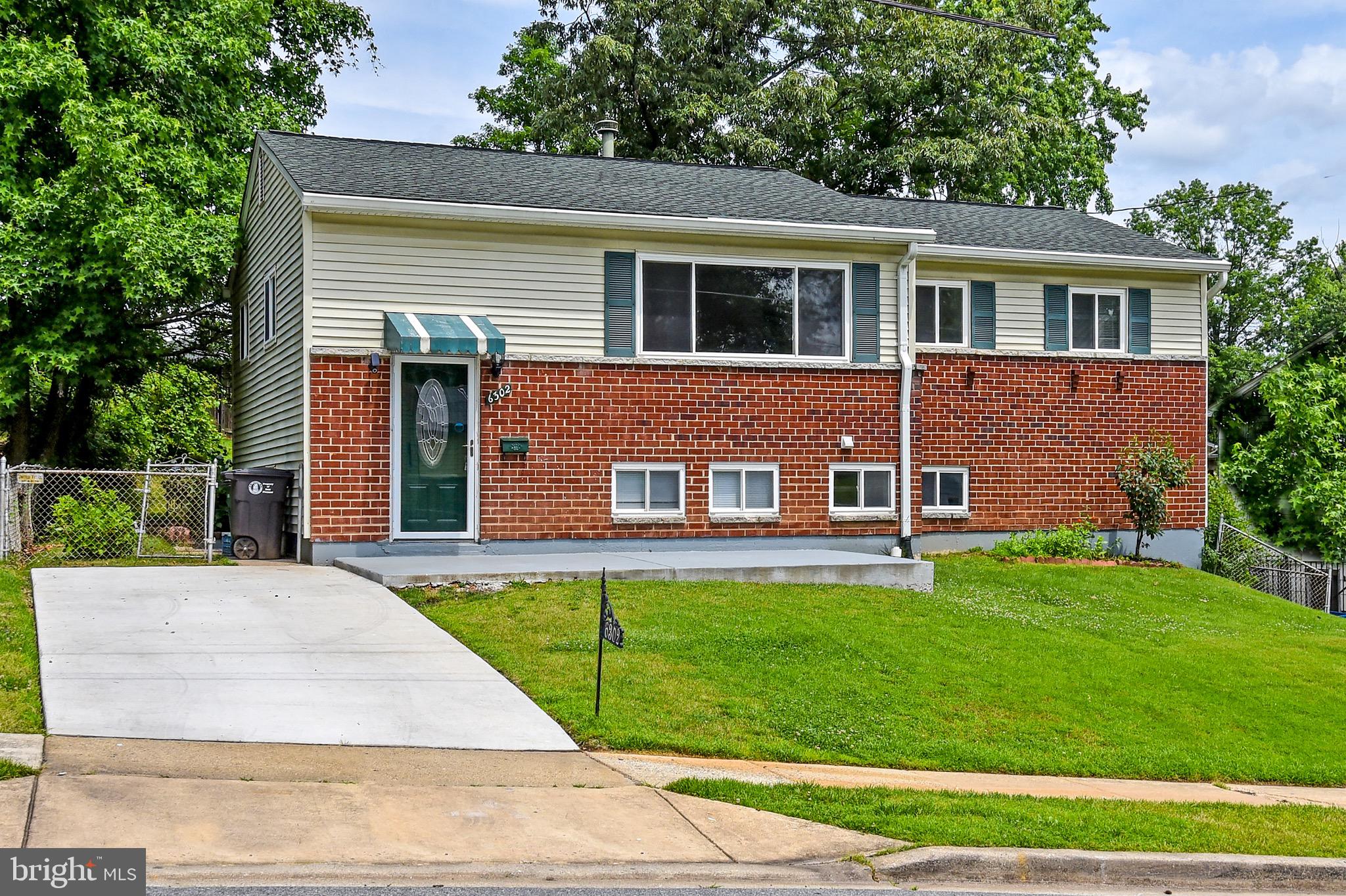 Remarkable and spacious home in Seat Pleasant on a sleepy street with beautiful woods view.  Boasting 3 bedrooms on main level and one bedroom on lower level, this home has newly refinished genuine hardwood floors, and recently replaced roof (2018), gas furnace (2018), and hot water heater (2018).  Lower level has a family room, large bedroom and full bath along with a large storage, laundry area and utility room in the rear of the lower level.