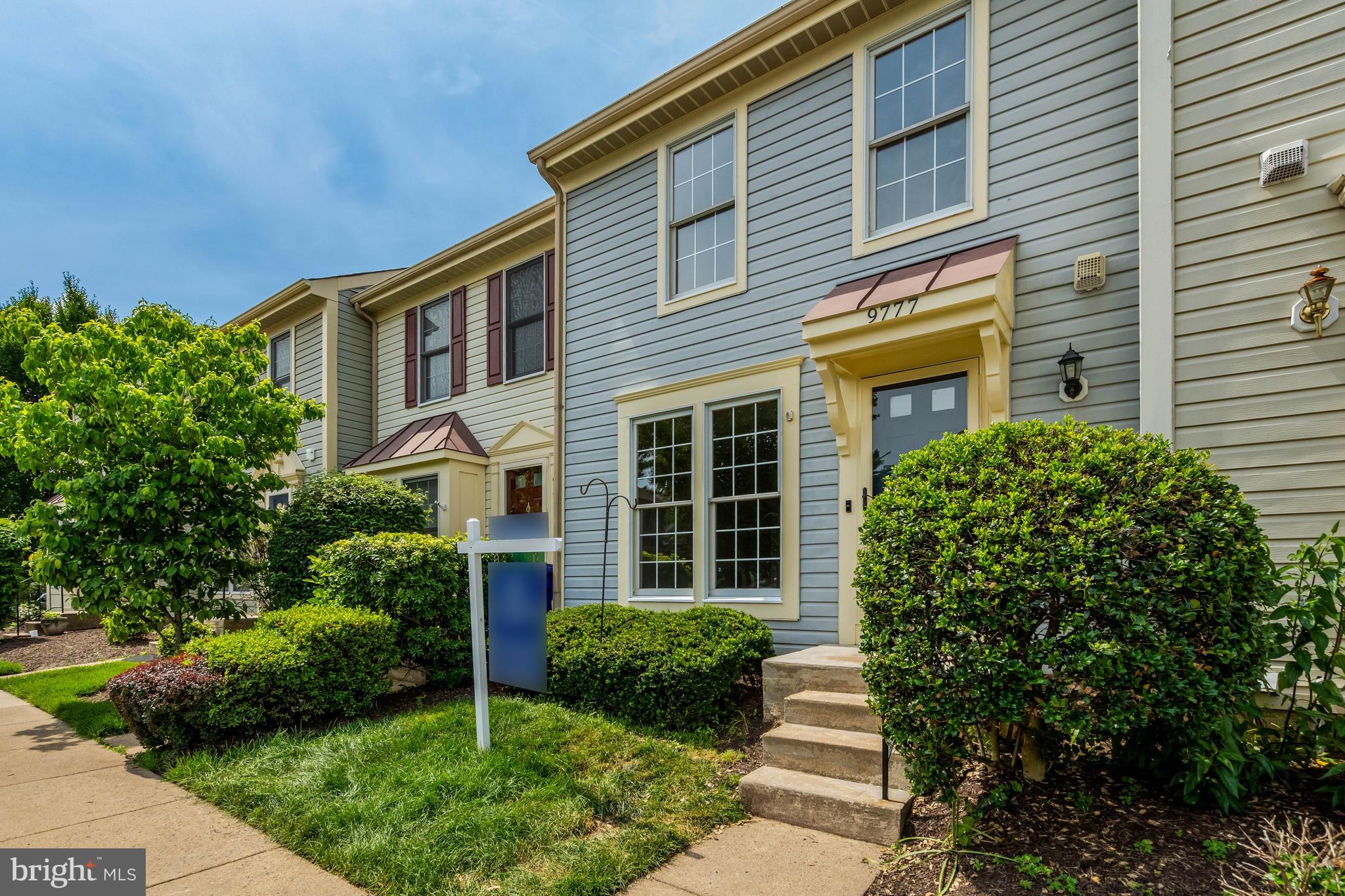 Welcome home to 9777 Mock Orange Court! This 3-level home features two bedrooms, three full bathrooms plus a powder room and a fully finished walk-out lower level! With a convenient location near Historic Downtown Manassas and shops, restaurants, and community amenities, this is a great home with a flexible floor plan. The entire interior has been professionally painted (2026), and there is new carpet in both bedrooms, the upper and lower stairs, and the lower-level recreation room (2026). The main level opens to the living room and dining room with laminated plank flooring. The kitchen has new butcher block countertops (2026), stainless steel appliances, recessed lighting and a breakfast area. The kitchen opens to the main level deck with great views of the open common space and trees - a great retreat for casual dining and entertaining. The upper-level features two bedrooms and two full bathrooms. The primary bedroom has an ensuite bathroom with a ceramic tiled shower/tub. The second bedroom has a walk-in closet and views of the trees. There is also a full hall bathroom with a shower/tub. The fully finished walk-out lower level offers great options. The recreation room has views of the trees and common space. The recreation room leads to the lower-level patio - a great space to relax and entertain! There is also a full bathroom on this level - complete with a shower/tub. Need storage space? Look no further! There is understair storage space and a large storage/laundry room on this level. There is a workshop table and a side-by-side washer and dryer in the storage room. Now for the additional updates! HVAC (2022). Roof (2018). Kitchen SS appliances (2020). Laminate plank floors (2019). Commuters have easy access to I-66, Route 28, and Prince William Parkway. Enjoy the comfort of a flexible floor plan, an updated and upgraded home, and a location in the community with great views of trees and green space to enjoy from all levels of the home!