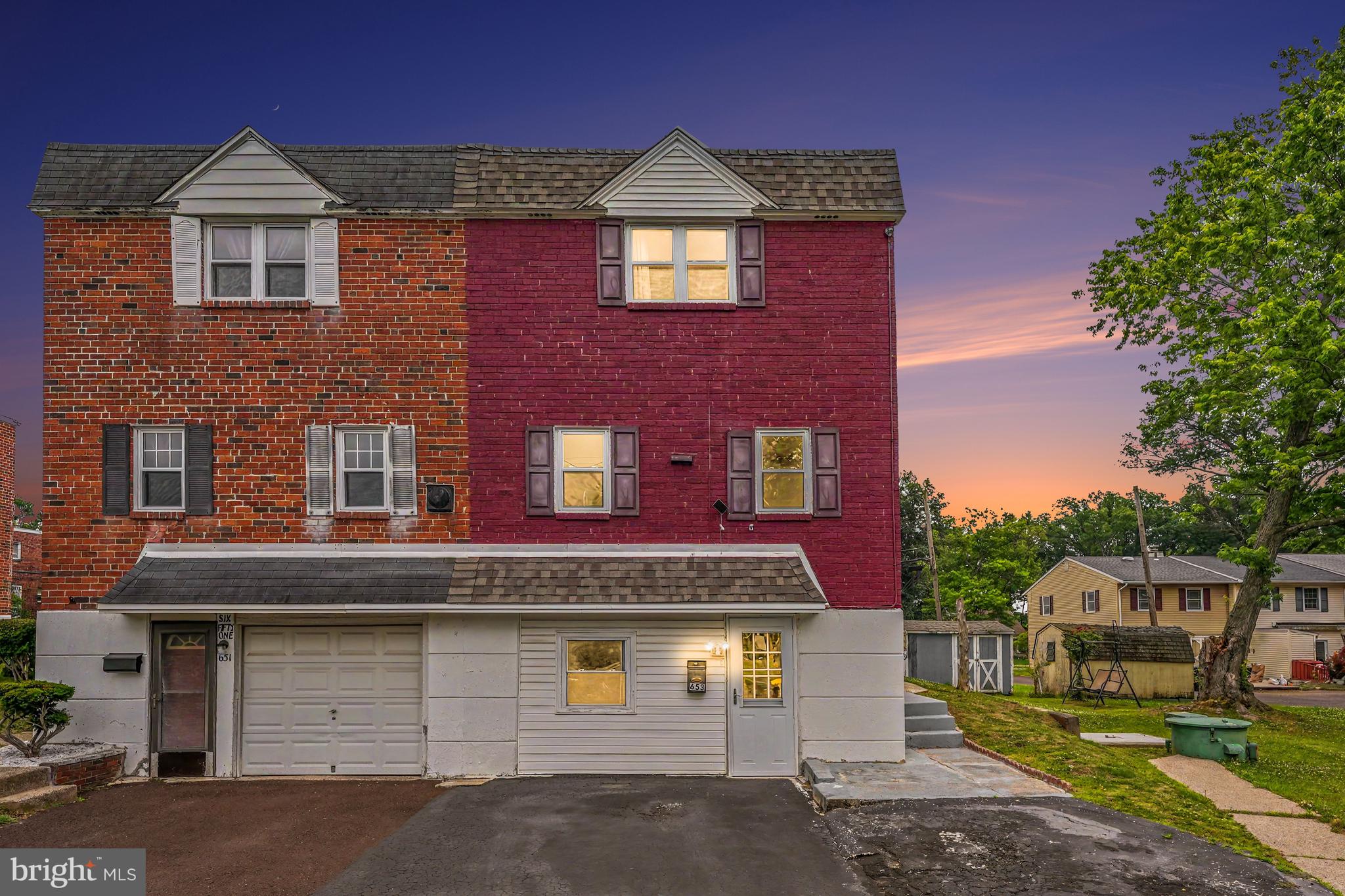 Set at the end of a charming cul-de-sac street in the heart of Lansdale Borough, this spacious twin home offers room to grow, entertain, and enjoy all that this vibrant community has to offer. With 5 bedrooms, 3 full bathrooms, and 1 half bathroom, this home provides a flexible floor plan ideal for a variety of living arrangements.
Step inside to find a bright and inviting living room highlighted by a beautiful picture window that fills the space with natural light. Gorgeous flooring flows through the living and dining rooms, while ceiling fans add comfort and style to both spaces. The first floor also features a convenient wide coat closet, powder room, and an oversized updated kitchen designed for both everyday living and entertaining. The kitchen is equipped with granite countertops, tile backsplash, ceramic tile flooring, updated wood cabinetry, and stainless-steel appliances including a five burner double oven gas range with hood, refrigerator, dishwasher, and microwave.
The enclosed sunroom provides additional living space and a relaxing spot to enjoy your morning coffee, create a reading nook, or simply take in views of the rear yard. The second floor features a spacious primary suite complete with a walk-in closet featuring beautiful flooring and a private ensuite bathroom with a tiled stall shower and separate sink area. Two additional bedrooms and a full hall bathroom with tile flooring, tub/shower combination, and newer skylight complete this level.
The lower level expands the home's versatility with two additional bedrooms. One bedroom includes a walk-in closet and private ensuite bathroom with a tub/shower combination, making it ideal for guests, extended family, or a private retreat. This level also includes the laundry/utility room.
Outside, the rear yard provides plenty of space for gardening, outdoor activities, or simply enjoying the fresh air. The location at the very end of the street offers additional parking opportunities and picturesque park-like views.
Enjoy being close to Lansdale Borough's restaurants, shops, parks, schools, community events, and entertainment options, while also benefiting from convenient access to major highways for an easy commute.
Please note that some photographs have been virtually staged for decorative inspiration. The living room, kitchen, and primary bedroom have been digitally enhanced to illustrate potential furniture placement and design possibilities.