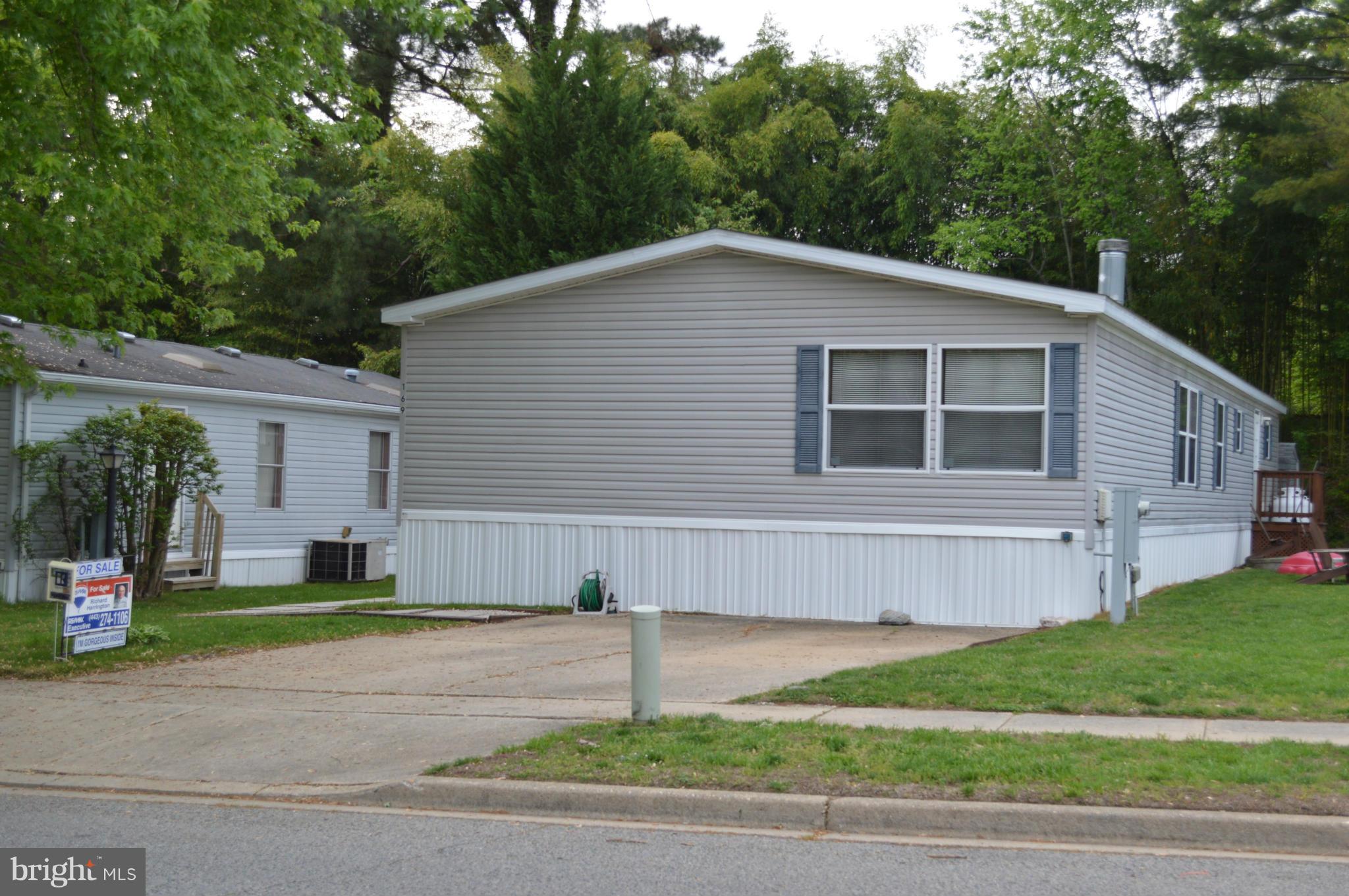 BEST VALUE IN THE COUNTY!!! Hard to find 4 bed 2 bath Double Wide in one of the best communities in the county Boones Estates!!  It is in FANTASTIC condition, and has been meticulously maintained. No pets or smokers have ever lived inside. Appliances look almost brand new, large master bath with soaking tub and shower, great shed and PATIO outside, walking distance to pool,  and tennis.