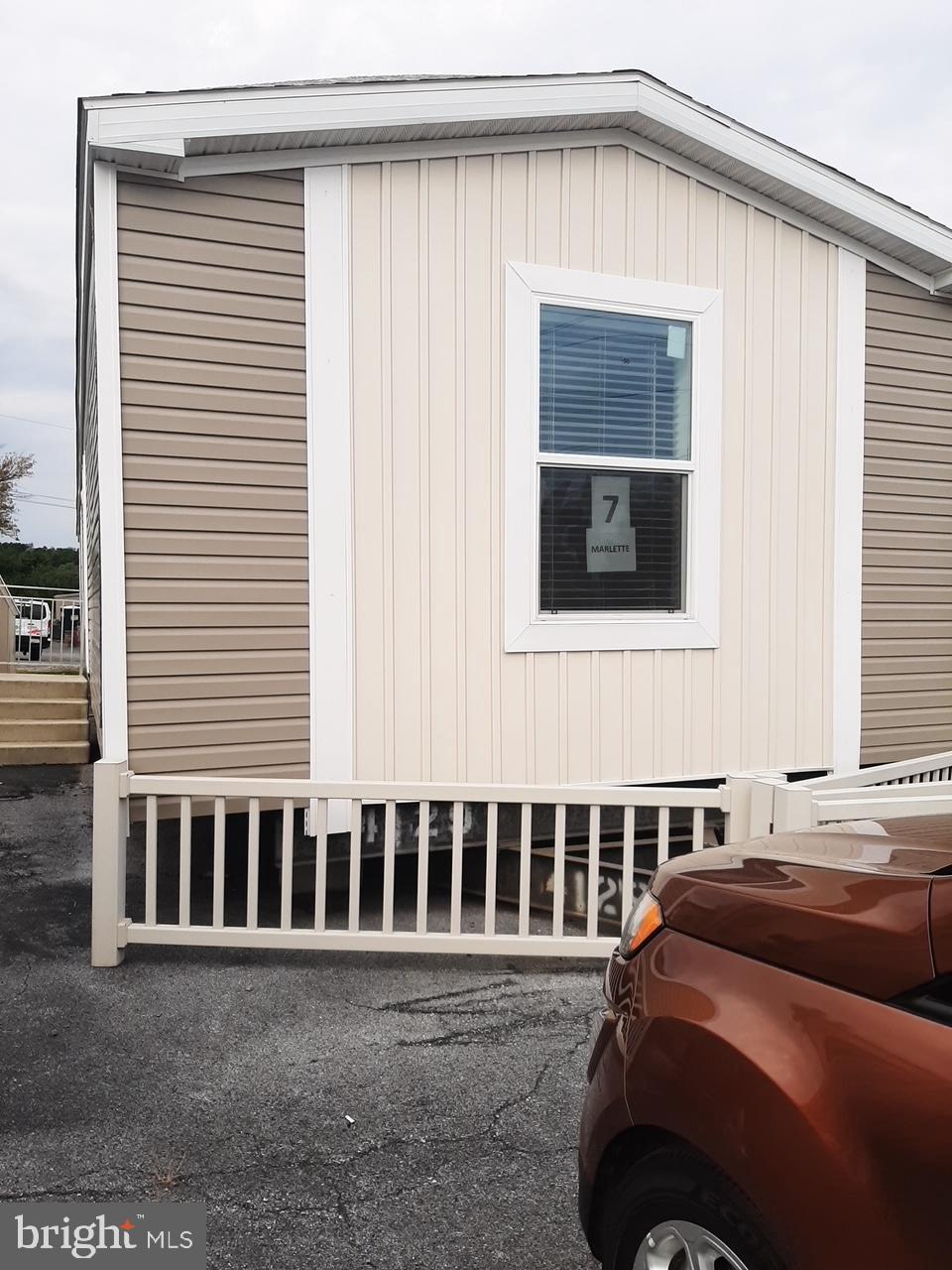 Come see this  three bedroom ,two full bath.  Kitchen has island, deep farmer's sink with pot faucet. Tall deep cabinets & upgraded counters. Living Room is an open floor plan. Master bedroom has a suite with standup large shower and soaking tub. Laundry room is separate  and has a closet for laundry items. This home was built in 2018 and the owners bought it off the showroom lot.   A MUST SEE for the extras. Private two-car driveway.  Spacious yard.  Buyers must be approved by park. Rent is $745. Call for more details.     Listing agent related to sellers  P ROPERTY REDUCED SELLER HAS FOUND HOME OF CHOICE COME SEE YOUR DREAM HOME !!!!!!!!!!!!