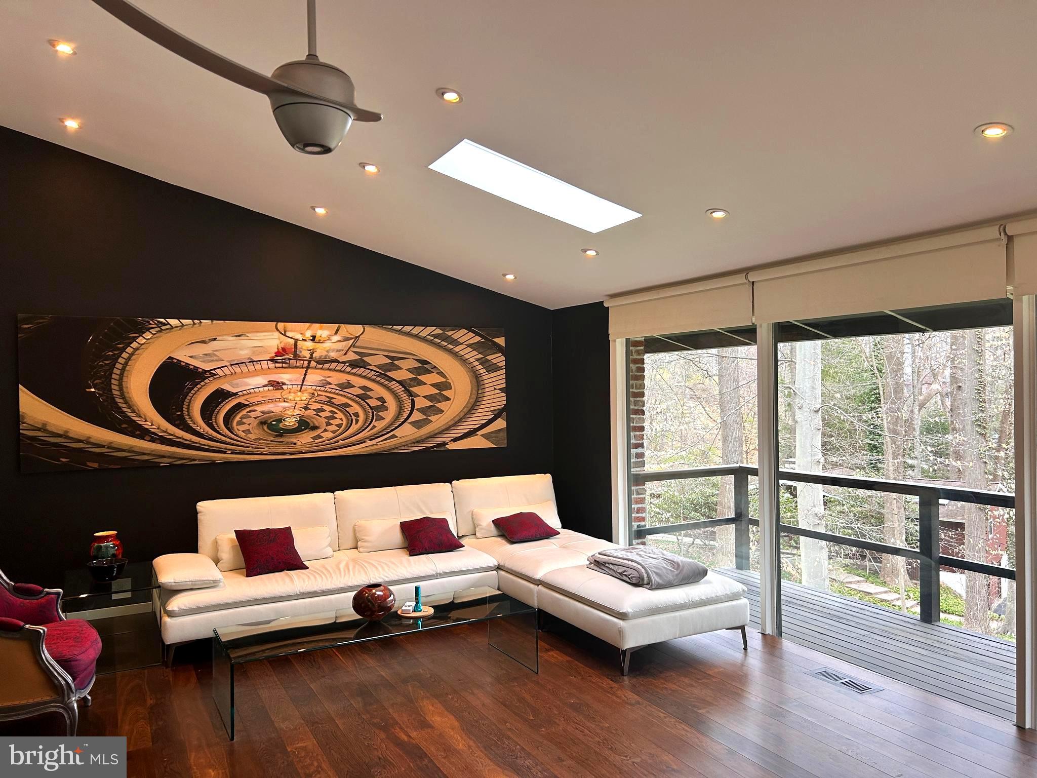 Experience unparallelled luxury and privacy in this stunning contemporary home situated on a serene, one-acre wooded lot, (1.1 acres) offering an exceptional living experience in the highly sought-after Tredyffrin-Easttown School District. The home features 3 bedrooms, 3 full & stylish bathrooms, tiled from bottom to ceiling, effortlessly combining modern design with care-free living! The downstairs which is above ground level is spacious, has its own sliding door exit, and can be used as a second family room, or alternatively as a studio apartment for guests or multi-family living.  (approx. an additional 700 ft  living space)
The house was entirely gutted in 2013/14 and rebuilt with prime materials. All new spray insulation was administered to walls and ceilings. For your comfort,  underfloor heating was installed throughout the entire house, a geothermal heating system  (unit replaced in April 2025), as well as a brand-new kitchen where you can find a large granite island, and all MIELE appliances, PLUS  a steamer.
The kitchen cabinets were custom built by the Amish. All other closets in the BRs are equipped with built-in interiors.
The house had a new roof installed in 2019 and all windows were replaced with double glazing!
The siding to the house was replaced entirely by cement tiles - not hardiplank but tiles - to better withstand the weather conditions! You will never have to replace those again.
We will let you experience this open floor "glass house" by yourselves... Enjoy!