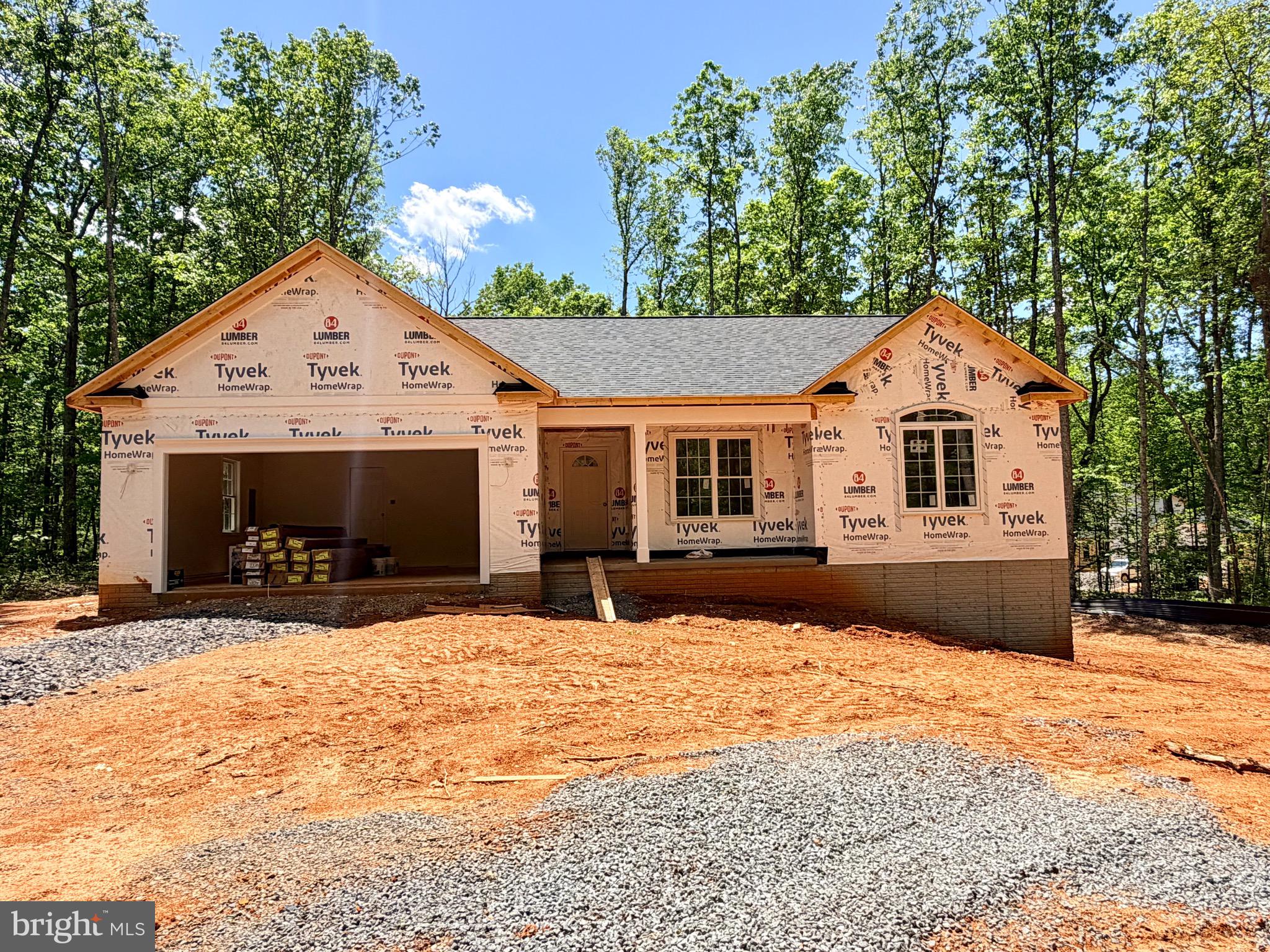 UNDER CONSTRUCTION! CHARLESTON II MODEL - LOT 1- Located on a lovely 2.97 acre mostly wooded lot. Home will include an open floor plan with Stainless Steel Appliances and Granite Counter Tops in kitchen, Cultured marble vanity tops in the bathrooms, Covered front porch, Unfinished Basement with bathroom rough-in for future expansion and a 2 car garage. Call for more information or to schedule a showing! Road Maintenance Agreement. MID JULY COMPLETION DATE!  FYBERLYNC Available! Please call Fiberlync for more information and confirmation.