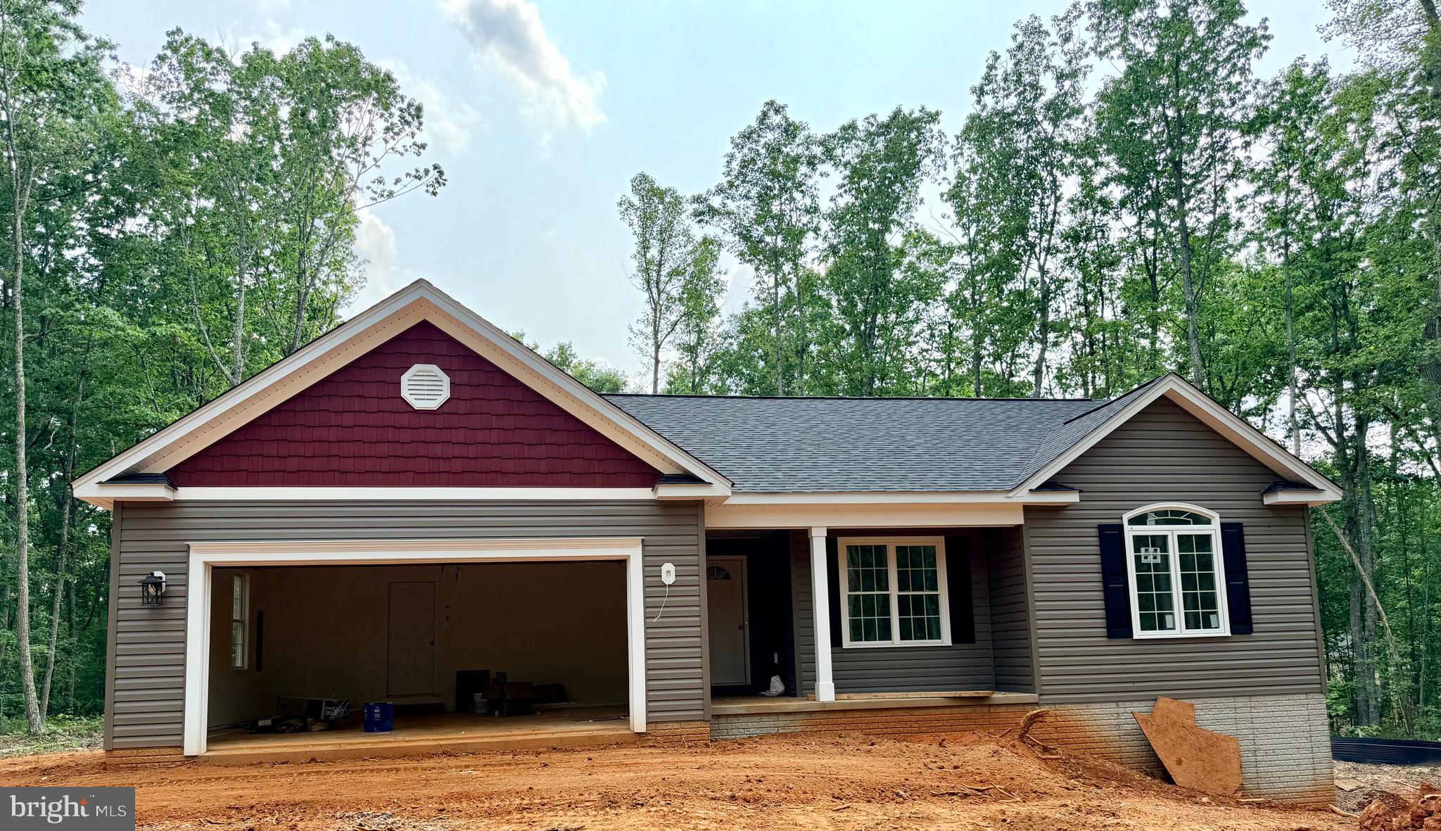 LATE JULY COMPLETION! CHARLESTON II MODEL - LOT 1- Located on a lovely 2.97 acre mostly wooded lot. Home will include an open floor plan with Stainless Steel Appliances and Granite Counter Tops in kitchen, Cultured marble vanity tops in the bathrooms, Covered front porch, Unfinished Basement with bathroom rough-in for future expansion and a 2 car garage. Call for more information or to schedule a showing! Road Maintenance Agreement. FYBERLYNC Available! Please call Fiberlync for more information and confirmation.