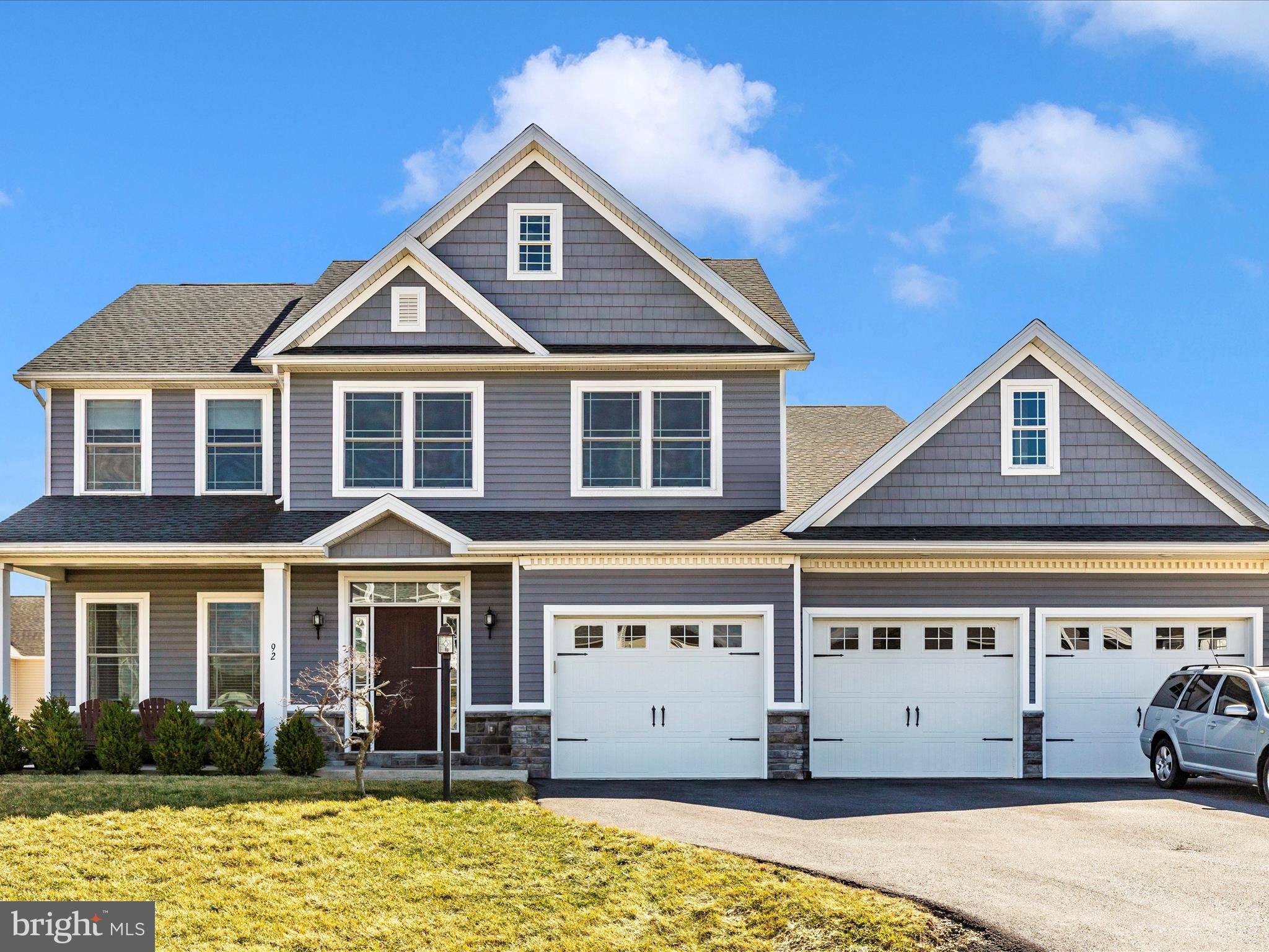 Looking for a dream house? This is it! Welcome to 92 Morgan Court located in sought-after Rolling Hills subdivision and part of Greencastle-Antrim school district. You will fall in love with this stunning, 4 bedroom colonial-style home built in 2018. Have you always wanted a two story foyer? Look no further!  Entering the TWO STORY FOYER with plenty of natural light, you will appreciate the adjacent dining room which features CROWN MOLDING and wainscotting.  The upscale kitchen features an oversized ISLAND with pendant lighting overhead, GRANITE counters,  and STAINLESS STEEL appliances.  There are 9' ceilings throughout main level. All four bedrooms are located on upper level. The OWNER'S SUITE, with TRAY CEILING, offers a spacious walk-in closet and attached primary bathroom. The PRIMARY BATHROOM features CERAMIC TILE flooring, an oversized vanity with double sinks, a SOAKING TUB with tile backsplash, and walk-in shower. The additional three guest bedrooms are all generously sized rooms and one even offers a walk-in closet.  The basement features a 18' by 18' rec room, laundry room, and large unfinished area which is perfect for storage. Plenty of parking awaits as this home features a THREE CAR ATTACHED GARAGE: a rarity in this subdivision. For the handyman, hobbyist, or car enthusiast: you will absolutely appreciate this garage which is separated into two separate rooms with a self-swinging door. One side features a one car garage and the adjoining side features a two car garage and WORKSHOP area. There is also a separate 220 volt service for the garage. The backyard offers a great space for relaxing featuring an OVERSIZED CONCRETE PATIO,  a PERGOLA, and hot tub which conveys with sale.  In 2020, a 12' by 16' garden shed was installed in rear yard which matches exterior of home.  Don't wait: schedule your showing today!
