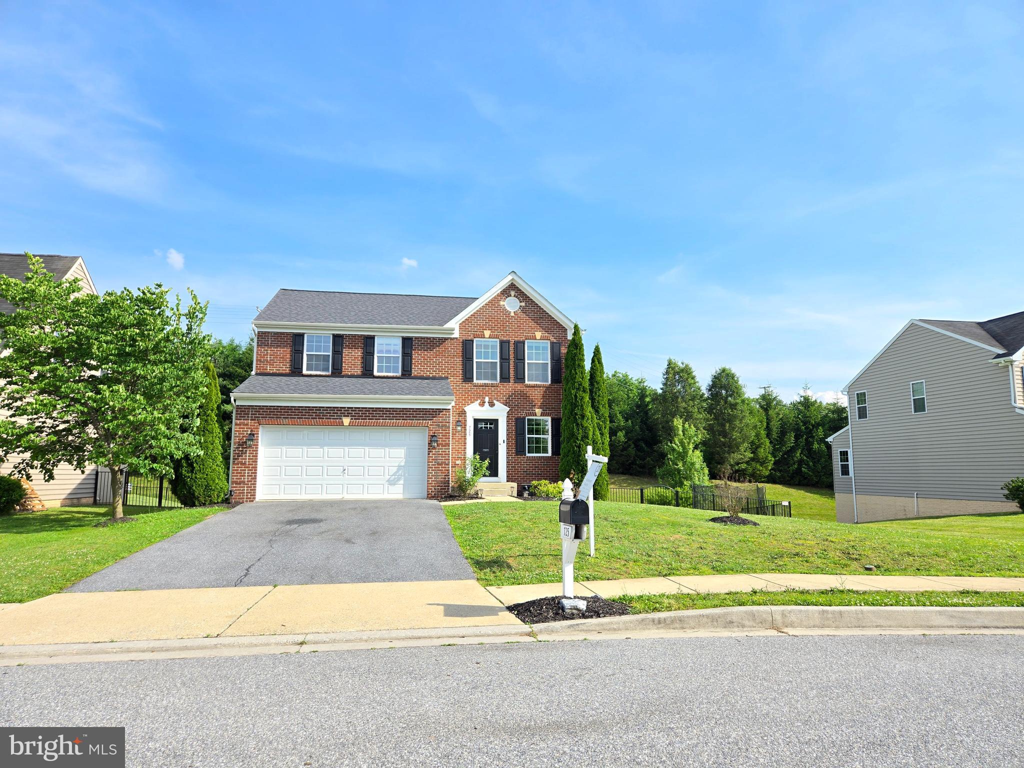 Discover the charm of CARROLL COUNTY, MD... near parks, orchards, professional offices, churches, view of countryside and great fishing places nearby, shopping, schools, commuter routes to Baltimore and Frederick this stunning Colonial home nestled in the desirable Village of Meadow Creek in Carroll County, MD. Built in 2012, this residence boasts a perfect blend of modern comfort and timeless elegance, offering 1,890 sq. ft. of thoughtfully designed living space. The well-appointed kitchen features a pantry and modern appliances, including a refrigerator, built-in microwave, and dishwasher, making meal prep a breeze. Enjoy your morning coffee in the delightful breakfast area, bathed in natural light. Retreat to the spacious primary suite, complete with a luxurious en-suite bath and a generous walk-in closet. Two additional bedrooms provide ample space for family, guests or a home office. The upper-level laundry adds convenience to your daily routine. Outside, the beautifully landscaped yard offers serene views of the garden and trees, creating a peaceful oasis. The exterior features include charming sidewalks, street lighting, and an attached two-car garage with a concrete driveway for easy access and extra parking. Unfinished, walkout basement presents endless possibilities for customization, whether you envision a recreation room, home gym, or additional storage. There is an extra room in the basement for extra flexibility with living or working space.  This home is not just a place to live; it’s a lifestyle waiting to be embraced. Minutes from shopping, professional offices, parks, lakes and even an orchards! Don’t miss the opportunity to make this captivating property your own!