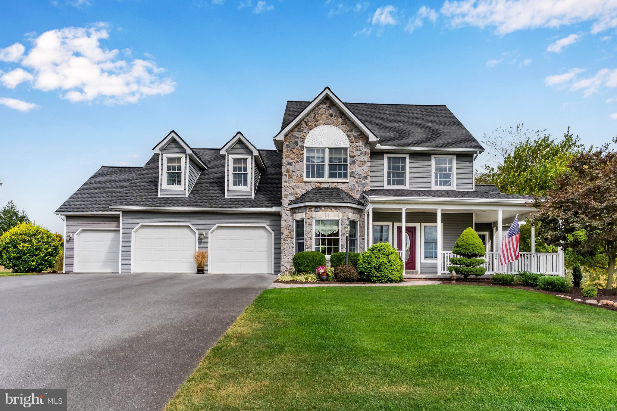 Nestled in the prestigious Whiskey Run Estates, this exquisite Colonial style home offers a harmonious blend of luxury and comfort. Primary bedroom suite on main level. Four more bedrooms( one has playroom which could be office or den ) and family room upstairs and three full baths. This beautiful one owner home was  designed for both relaxation and entertaining. The heart of the home features an open floor plan, showcasing a gourmet kitchen with upgraded stainless steel appliances, including a self-cleaning oven and quartz counters.  Enjoy cozy evenings by the gas fireplace in the great room, or host formal dinners in the separate dining area. Step outside to discover a beautifully landscaped 0.66-acre lot, complete with a front wrap-around porch(oh the beautiful sunsets!!) ) and spacious paver patio off  the back porch. The property is equipped with modern conveniences, including a security system and underground lawn sprinklers. With a three-car garage and ample driveway space, this home embodies an exclusive lifestyle, inviting you to create lasting memories in a truly remarkable setting. Lifetime warranty large Marathon hot water heater, roof replaced 2020. New Geo thermal system installed 2025! Create in home theatre or workout/gym room and hobby room in your  future years. Come quickly to see this "ready for US"  listing - your future residence !