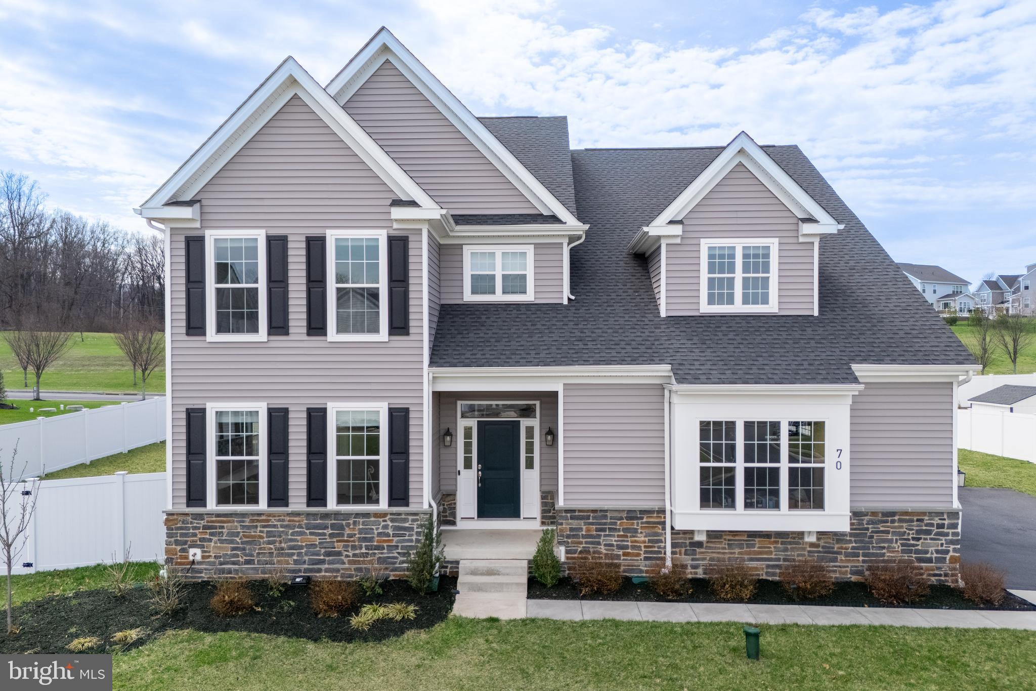 OPEN HOUSE ON SUNDAY, JUNE 7, 1:00-3:00 Thoughtfully upgraded, well maintained, and just minutes to I-78, where you’ll enjoy easy access to both Manhattan and Philadelphia in only 90 minutes. This 2023 home features wide plank LUXURY VINYL FLOORING for a seamless, inviting feel. A light-filled SUNROOM offers a perfect spot to relax, while a LARGE BACK DECK with both a COVERED and OPEN AREA equipped with a GAS CONNECTION for your BBQ grill extends living outdoors. The backyard is FULLY FENCED giving you privacy. A MAIN-LEVEL FULL BATH adds convenience and connects to a study that can serve as a guest room or bedroom. The kitchen features grey cabinetry, a blue island, quartz countertops, tile backsplash, and pendant lighting, with Whirlpool double ovens, a gas cooktop, and a Samsung refrigerator, completing this well-appointed kitchen. Additional upgrades include a 3-STAGE WATER FILTRATION SYSTEM and BLINDS THROUGHOUT, and a 3-CAR GARAGE. This home is move-in ready. The unfinished lower level offers ample storage and is PLUMBED FOR A BATHROOM, allowing for customization. A recent home inspection report is available upon request.