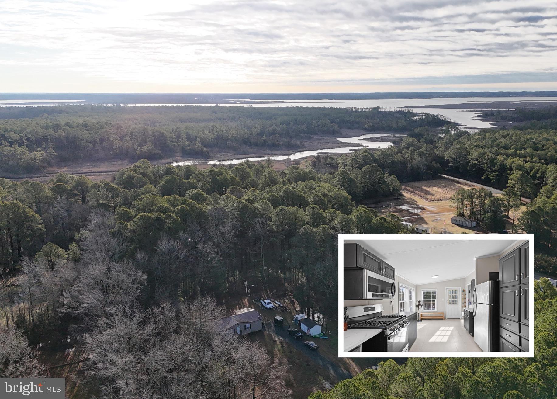 **Back on Market - Due to Buyer Losing Financing**  Discover the charm of coastal country living in this fully renovated 3-bed, 2-bath home on 1.6 private acres. Nestled near the water and backing to serene woods and Halls Creek, this property offers the perfect blend of tranquility and adventure. The open floor plan is filled with natural light, featuring luxury vinyl plank flooring, a stunning ceramic tile shower, and a recently updated kitchen with abundant cabinet space.

Enjoy the outdoors with a solar shower, a well-maintained storage shed, and a 16x32 concrete slab ready for a future garage. Upgrades include a new metal roof, subfloor, plumbing, gas stove, and cleaned ducts. Located on public water & sewer, with low property taxes and most furniture negotiable, this home is move-in ready and waiting for you!

Located close to marinas, docks, public boat ramps, and prime hunting grounds, this home is just a short ride from Pit & Pub in Fairmount - a breathtaking tiki bar. Embrace the best of Eastern Shore living—privacy, convenient water access, and endless outdoor adventures. Don’t miss this rare opportunity!