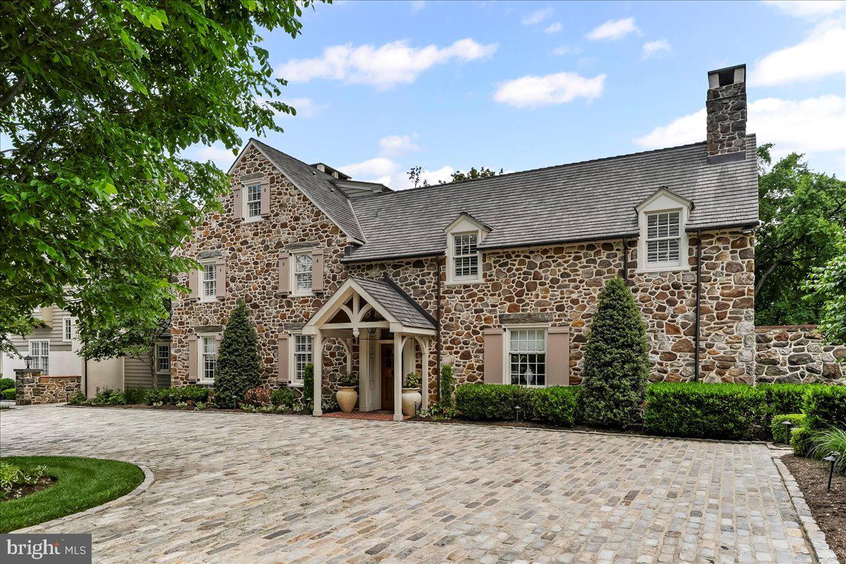 An Unbelievable  Opportunity To Own A One-Of-A-Kind Estate On Finely Landscaped 8.8 Private Acres In Radnor Hunt Built In The Early 1900's.  Nestled Amidst Towering Trees BLACKOAK  Is A Historically Significant Estate That Embodies The Perfect Union Of Classic Elegance And Modern Design.  This Is No Ordinary Home And Defines The Meaning Of True Luxury.  Current Owners  Have Made Many Improvements  Since Their Ownership Presenting A Move In Ready Opportunity To Own A Truly Distinctive Residence With An Unmatched Lifestyle.  To Further Enhance The Efficiency, Functionality And Aesthetics, The Home Is Now Equipped With Multi-Zoned Geothermal HVAC And Wired For A Whole House Generator.
This Is No Ordinary Home......Enter From Circular Belgium Block Courtyard  Area.  Continue On To The First Level Sunlit Piano Room With Stone Fireplace And Ship Lap Detailed Mantel.  Also Featuring Crown Molding, Chair Rail, Tray Ceiling, Custom Shades And Built In Cabinetry.  Not To Miss The Secluded Art Studio.  Plus A Pet Grooming Area.  Then Continue On To Powder Room, Coffee Bar With Marble Counter, Beverage Fridge And Microwave.  Continue On To Personal Reading Space That Opens Up To Formal Dining Room With Fireplace, Tray Ceiling, Unique Chair Rail.  Exterior Door To Outdoor Oasis Including Patio With Fireplace, Pizza Oven, Bar, Fire Pit , Pool And Spa All Overlooking Lushly Landscaped Grounds.  Not To Miss The Nighttime Affects With All Trees Illuminated.
Entire Kitchen Was Expanded By 10' Inside And Out And Totally Renovated In 2017.  All New Cabinetry, All New Appliances, Custom Stone Hood Over Range, Magnificent 10' Wooden Island With Seating , Marble Countertops, Farm Porcelain Sink, Beamed Ceiling,  Sub Zero Refrigerator, Sub Zero Freezer, WOLF 6 Burner Range With Grill, Walk In Pantry And Large Window Bench Table And Chairs.
Living/Family Room  Includes Custom Cabinetry, Fireplace With Custom Wooden Mantel, Beamed Ceiling, Bench Seating And Plantation Shuttered Doors To Patio And Additional Entertaining.
Upper Level Centered Around A Magnificent Primary Suite Wing With Two Baths And Two Dressing Closets. Both With Custom Builtins.  This Level Also Boasts An Expansive Double Washers And Dryers.  Highlighted With Large Soaking Sink And Built In Cabinetry.  Additional 2nd Bedroom With Private Bath And Highlighted With Fireplace And An Abundance Of Closets. Roomy 3rd Bedroom With Recessed Lighting And Hall Bath Complete This Level .  Stairway To 3rd Level Was Added By Owners Which Leads To An Additional 4th Bedroom And Private Bath.  Both Levels Highlighted With Plantation Shutters Throughout.
Exterior Of The Home Provides & Embraces The Home Being Noted As A True Showplace.  Highlights Include 6 Car Garage With Private Executive Office Located Above The Main Portion.  Office Has Private Entrance Leading To All New Expansive Area With Maple Wood, Custom Shelving, Plantation Shutters And 1/2 Bathroom.
Private Guest Home On The Property Provides A Large 1 Bedroom & 1 Full Bath .  Living And Dining Areas Along With A Fully Equipped Kitchen Highlighted With Viking Range And Sub Zero Fridge.  Pine Flooring, Fireplace, Plantation Shutters And Walk In Closet Add To The Charm Of This Retreat.  Outside Boasts A Private Area For Entertaining Along With A Firepit.