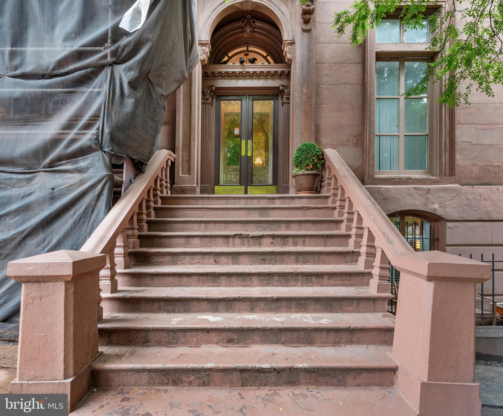 Enjoy sophisticated urban living in this stunning condo in a circa 1850s brownstone mansion just steps from the Washington Monument. Located on a brick-lined street, this two-bedroom, two-bath unit features a wall of windows overlooking a landscaped rear courtyard with views of one of Baltimore's most elegant carriage houses. No detail has been spared--the unit has a spectacular contemporary kitchen, soaring ceilings, tiled baths, a full-sized washer and dryer discreetly hidden behind a sliding mirror, and more than ample storage. Come and see it today, and make this amazing place your own!